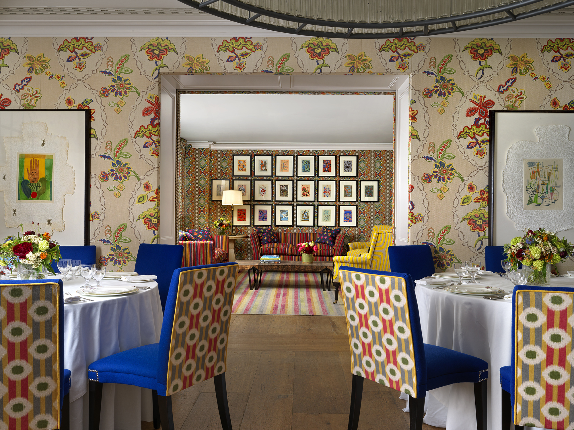 Round dining tables set-up in the Fortune private events room and lounge set up in Lyric room at Covent Garden Hotel