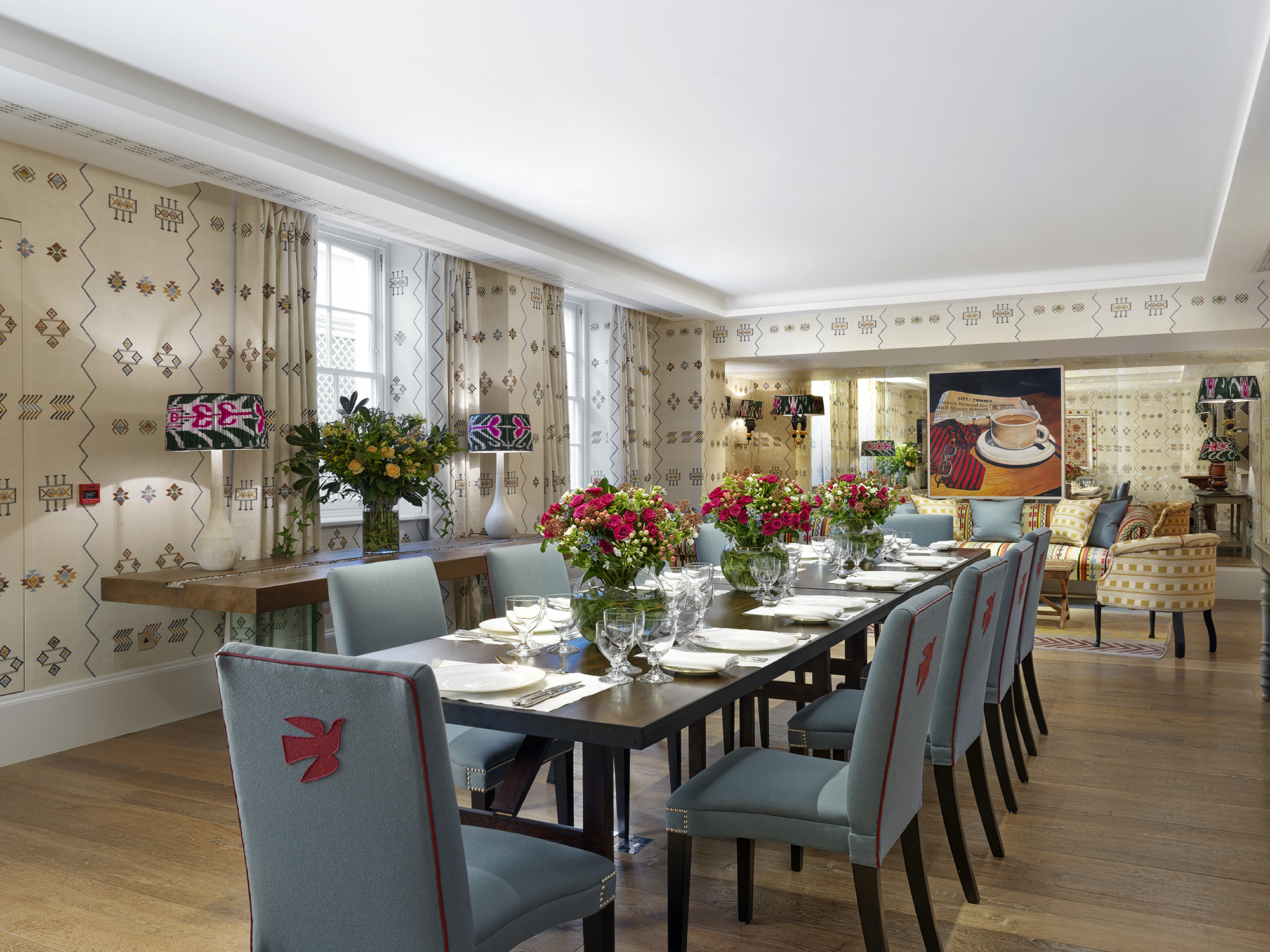 Day shot of a long dining table in the Rocklin private events room at Haymarket Hotel