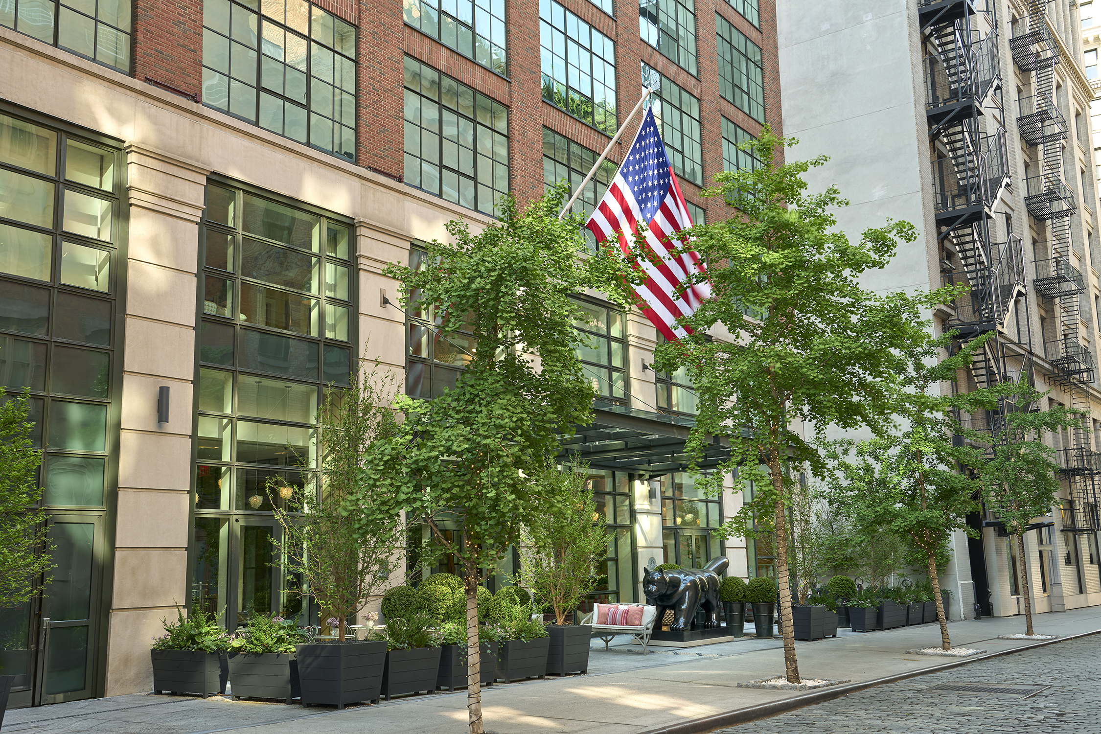 A diagonal shot of the exterior of Crosby Street Hotel