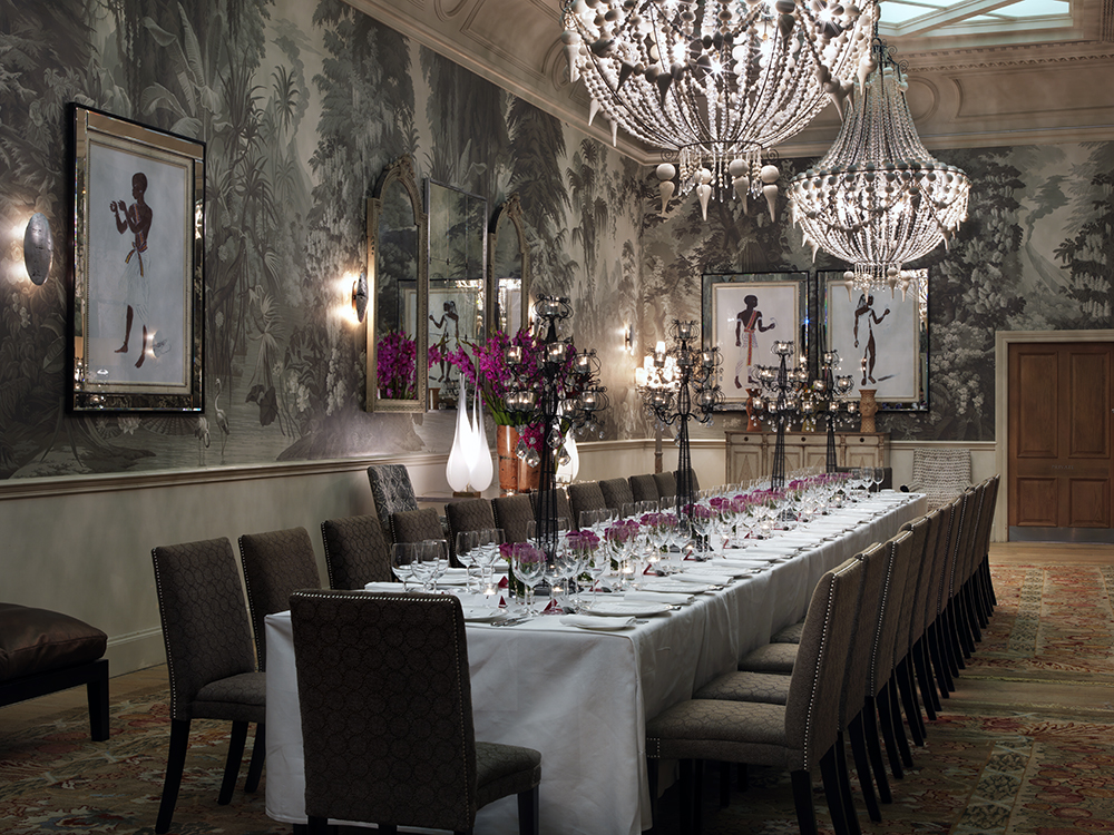 Long dining table in the Shooting Gallery private events room at Haymarket Hotel