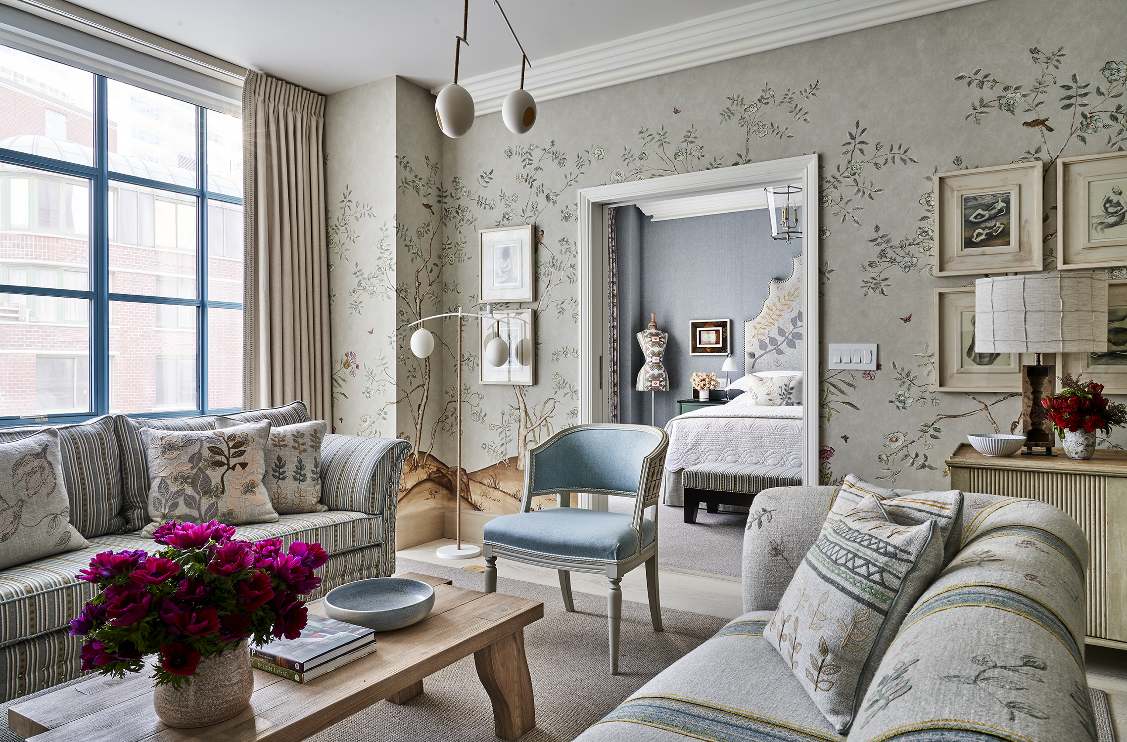 Diagonal shot looking through the living room to the bedroom of Songbird Suite, 704 at Warren Street Hotel
