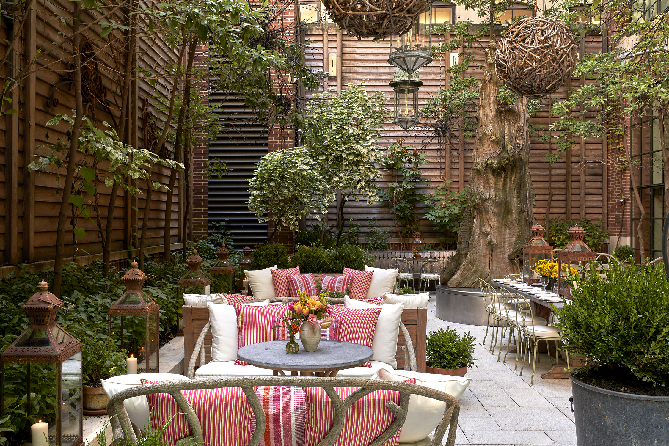 Wide shot of the lounge area of the Sculpture Garden at Crosby Street Hotel