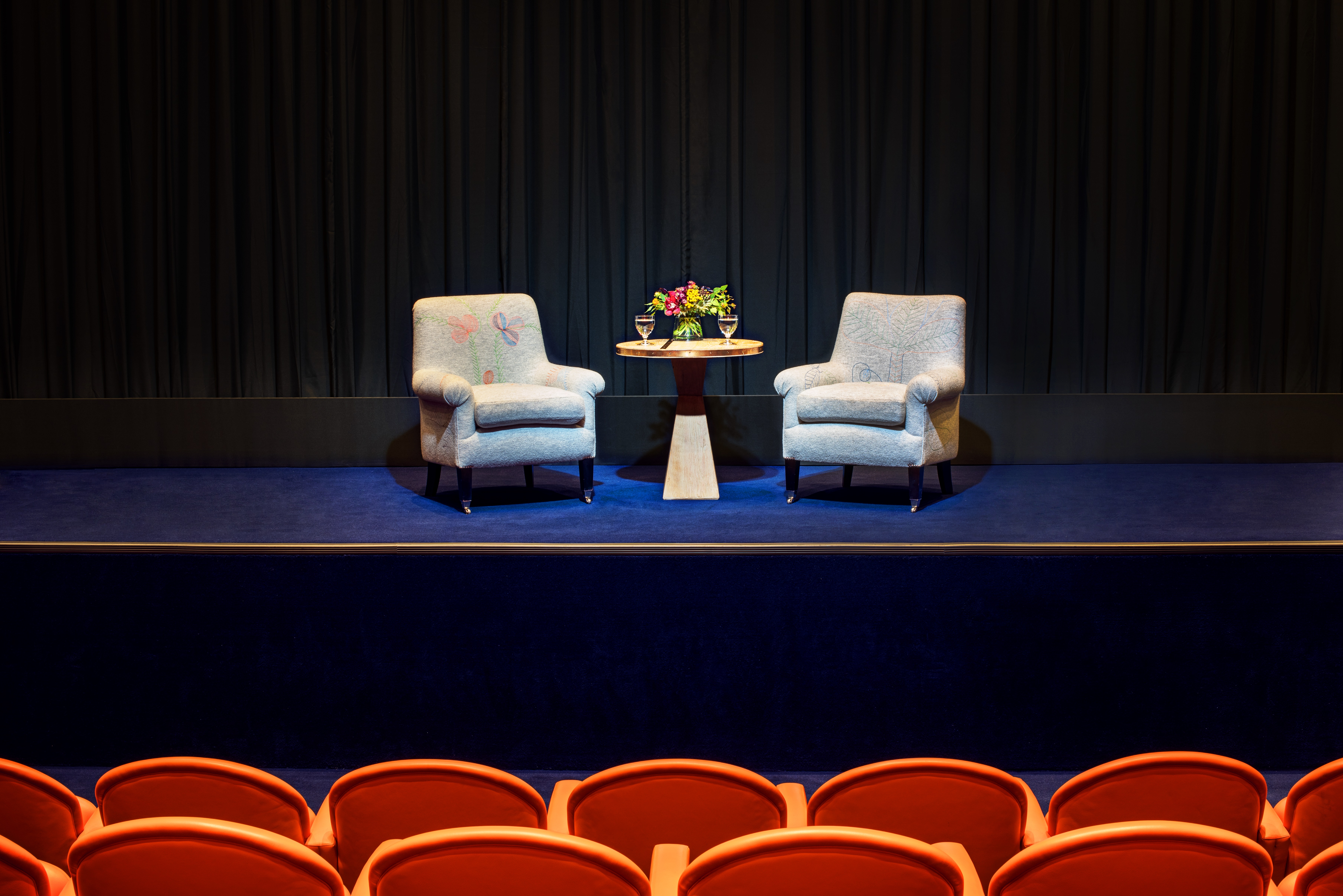 Close shot of a Q&A set-up in the screening private events room at Crosby Street Hotel