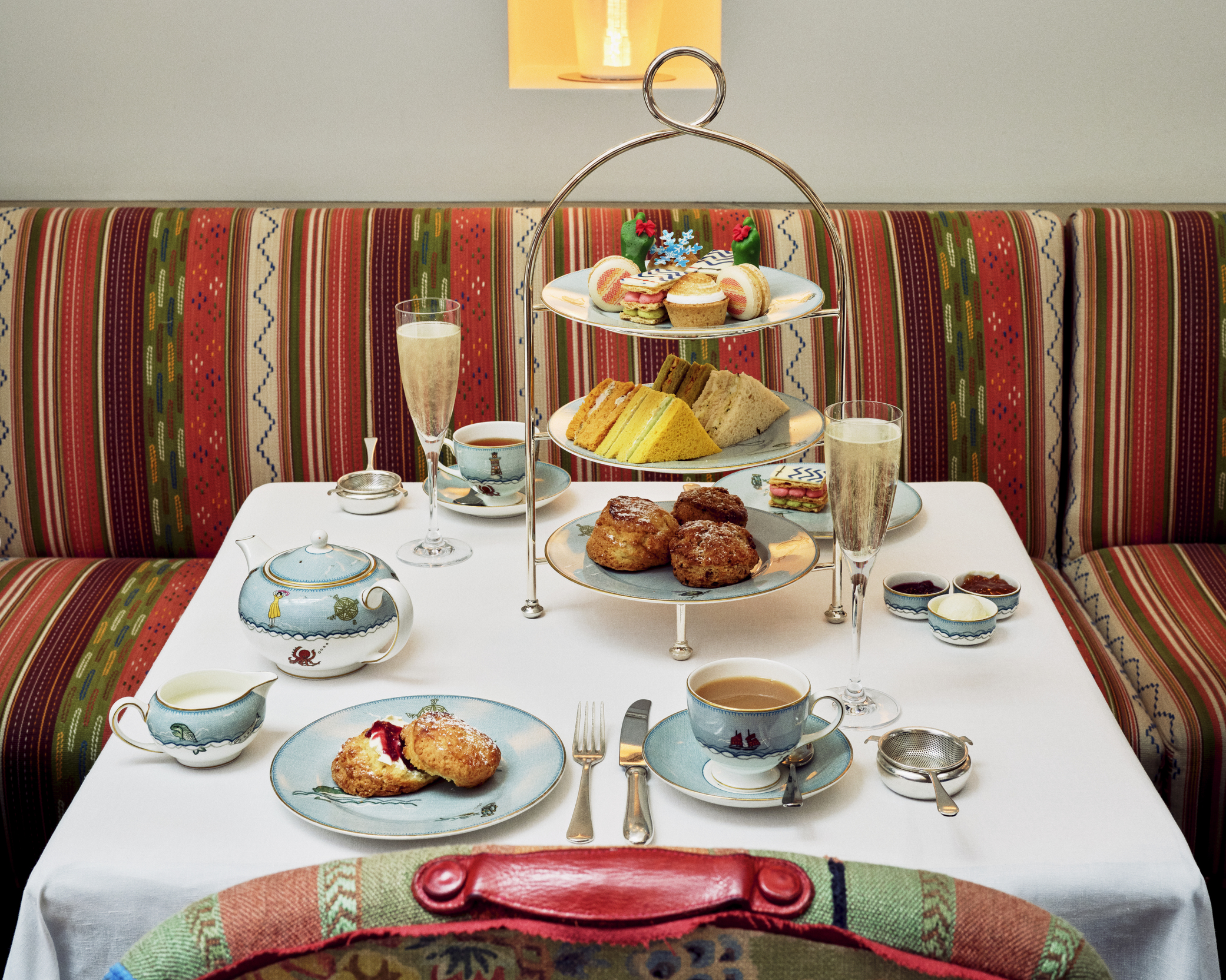 A festive afternoon tea set up on a table in The Orangery at The Whitby Hotel