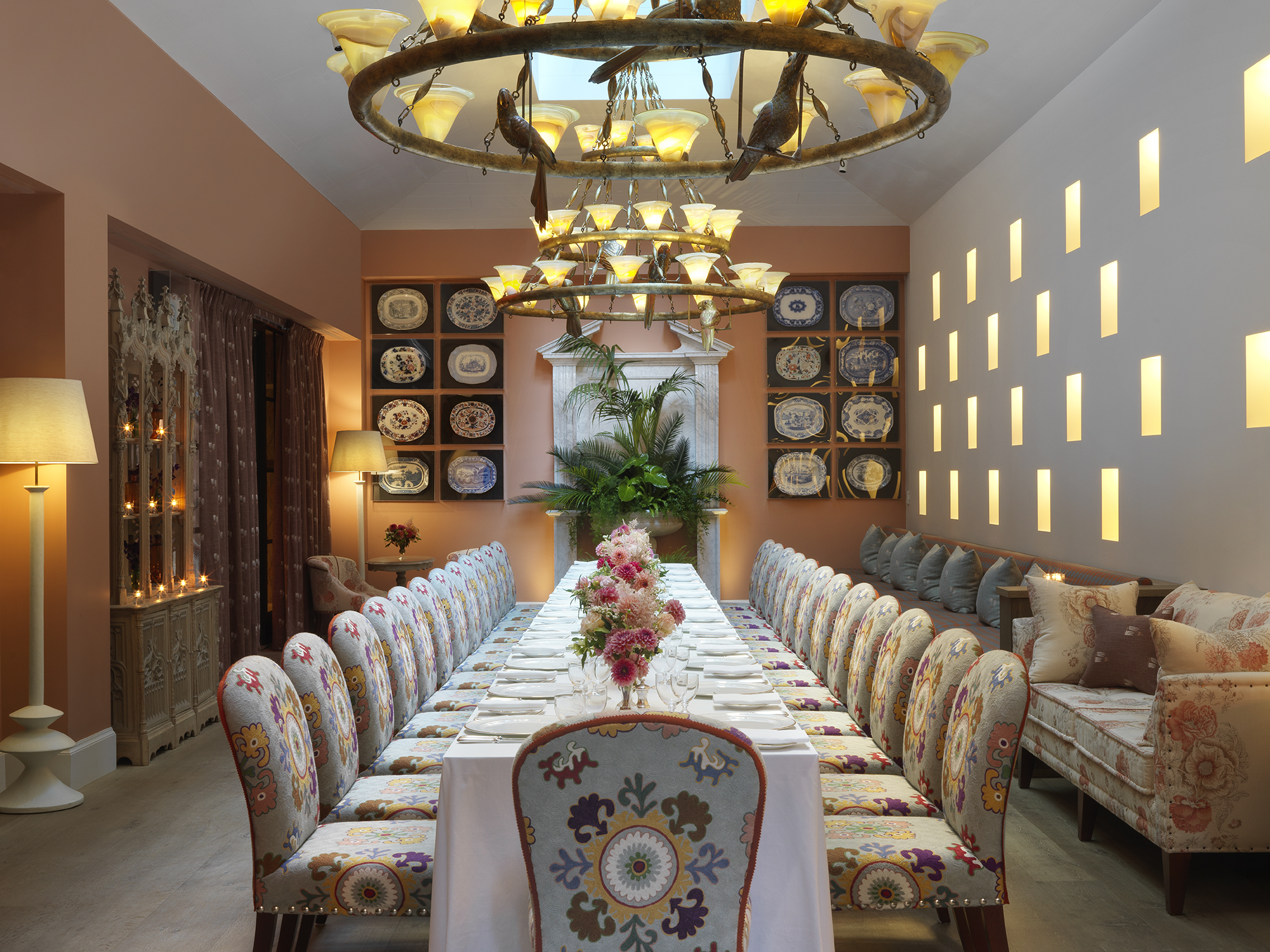 Long dining tables set-up in the Orangery private events room at the Whitby Hotel