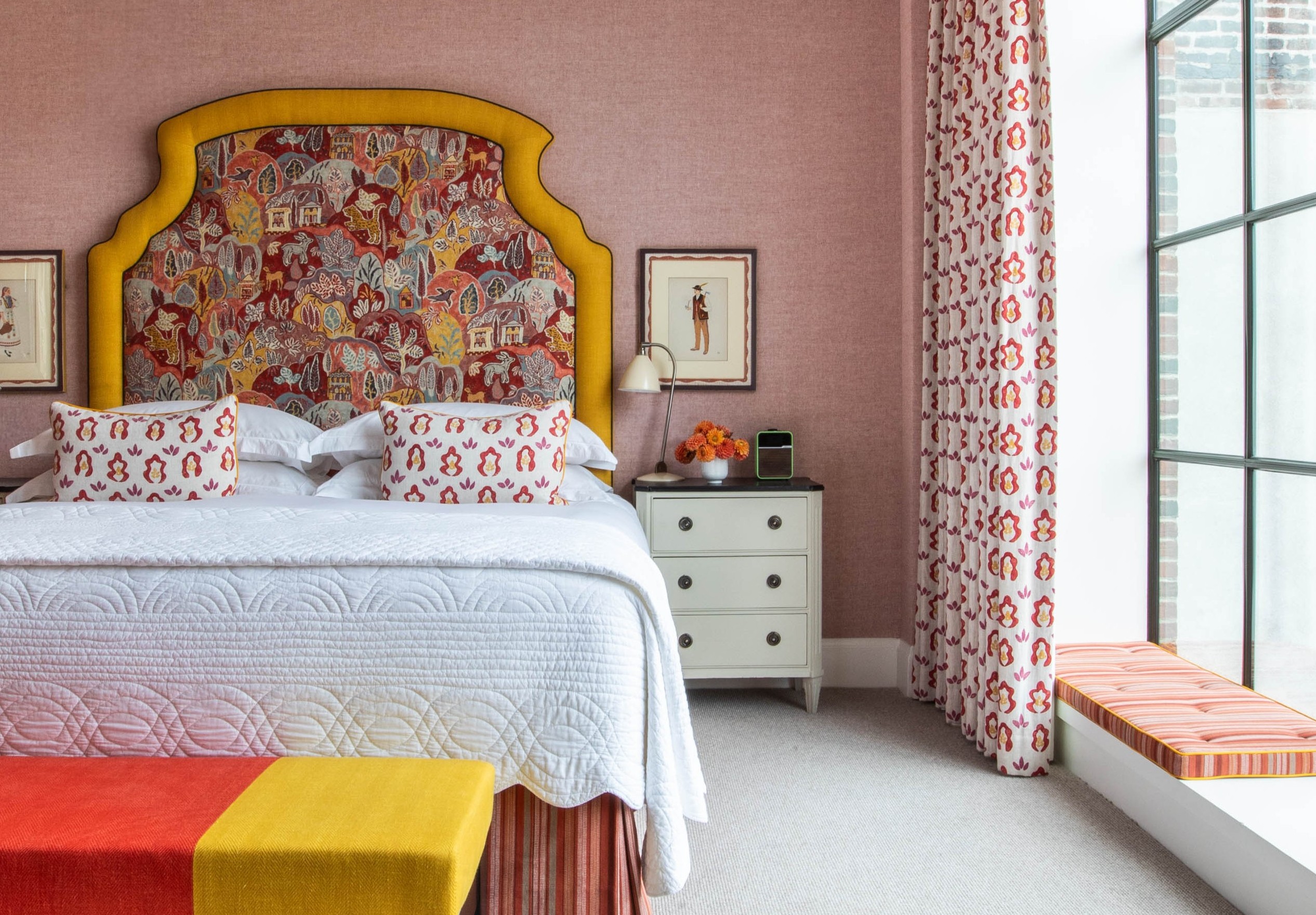 A straight on shot of the bed in room 809, a Luxury One Bedroom Suite at Crosby Street Hotel