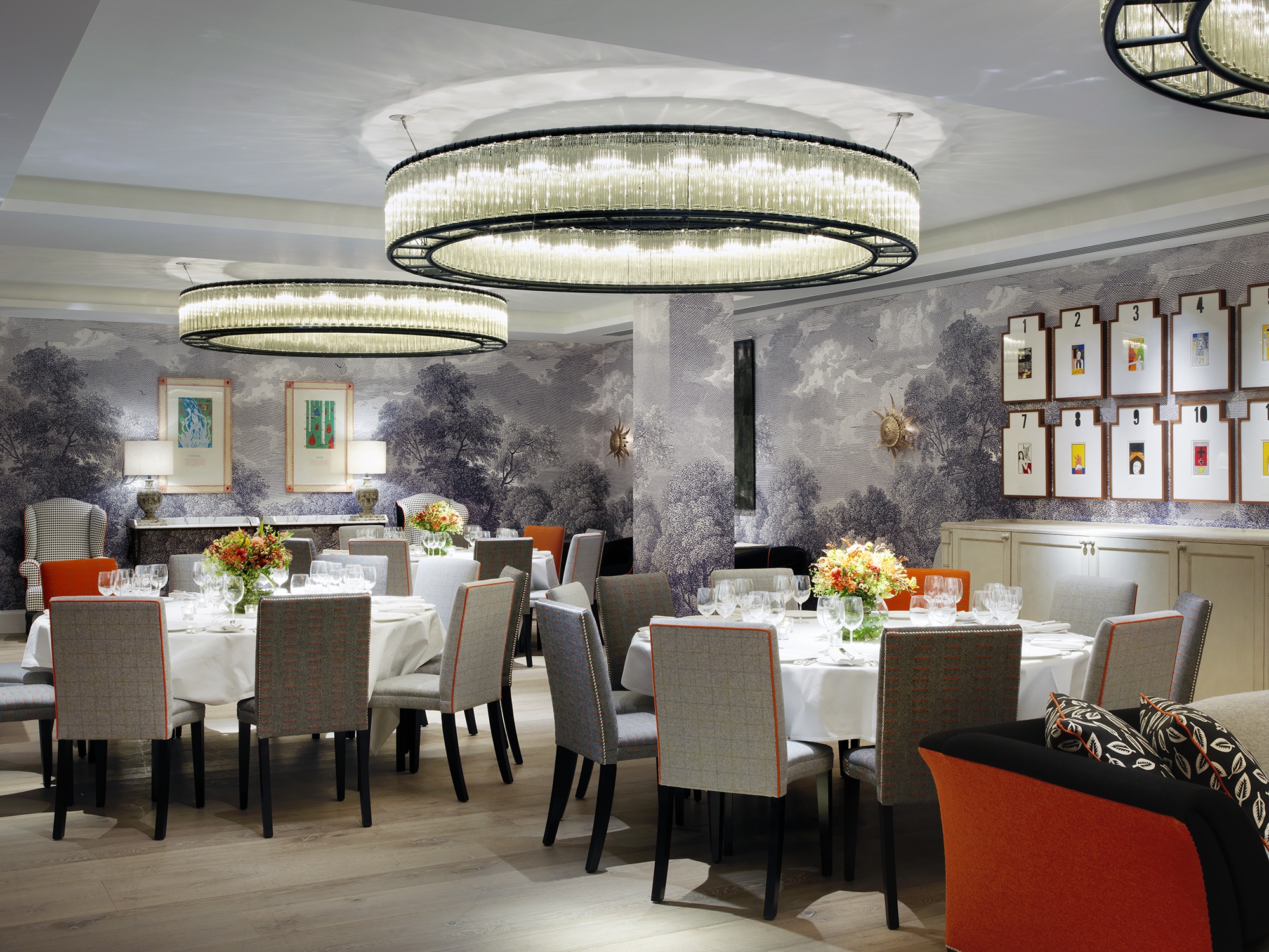 Round dining tables set-up in the Windmill private events room at Ham Yard Hotel