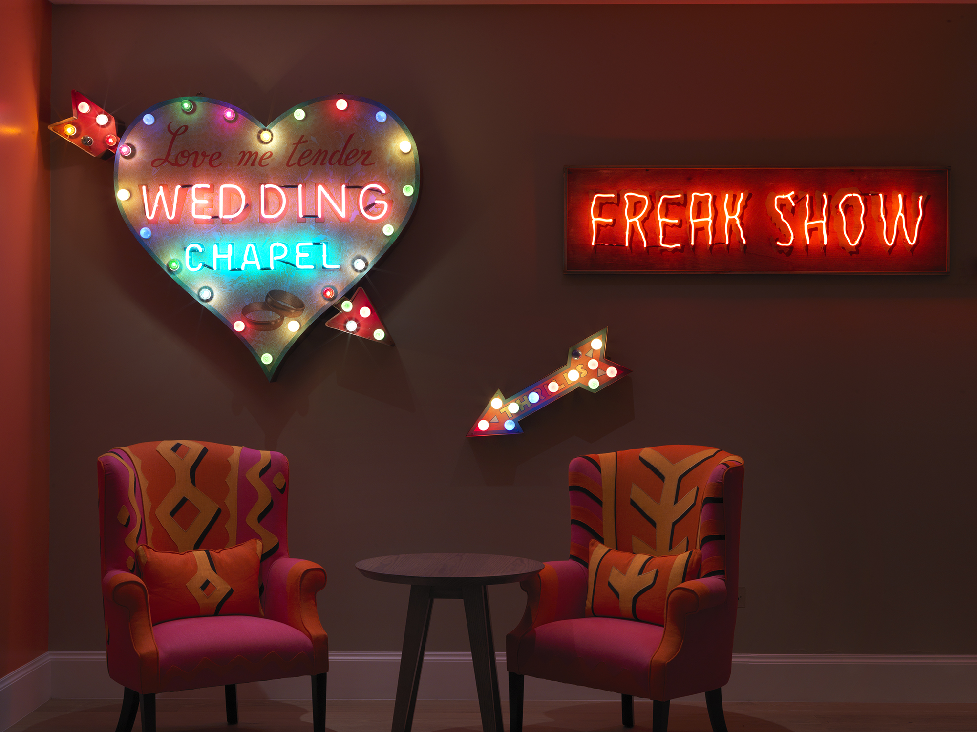 An image of the neon sign artwork in the private event space, The Dive Bar, at Ham Yard Hotel.