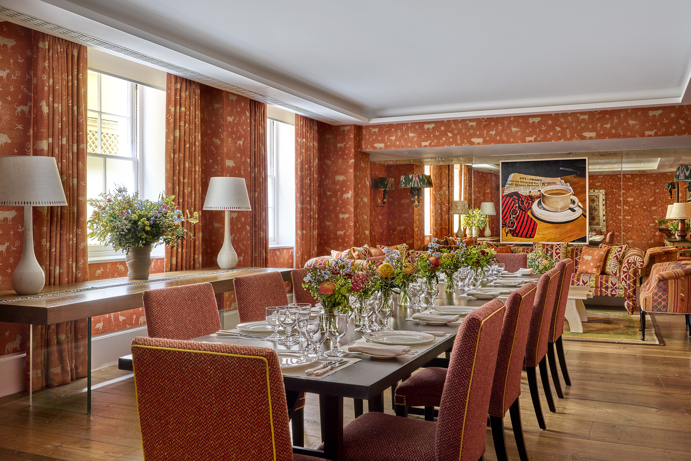 Day shot of a long dining table in the Rocklin private events room at Haymarket Hotel