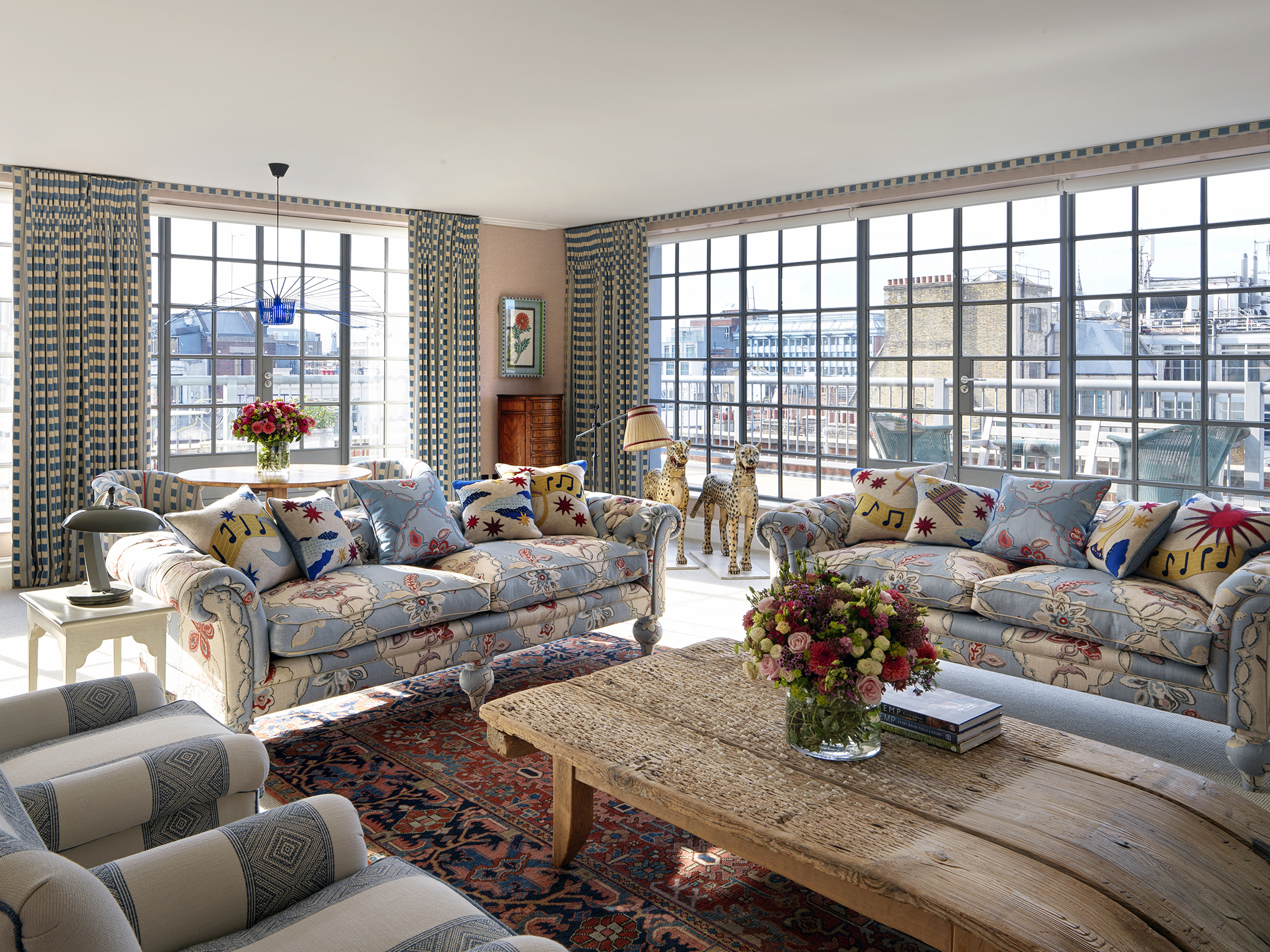 Diagonal living room shot of room 504, the One Bedroom Terrace Suite at The Soho Hotel