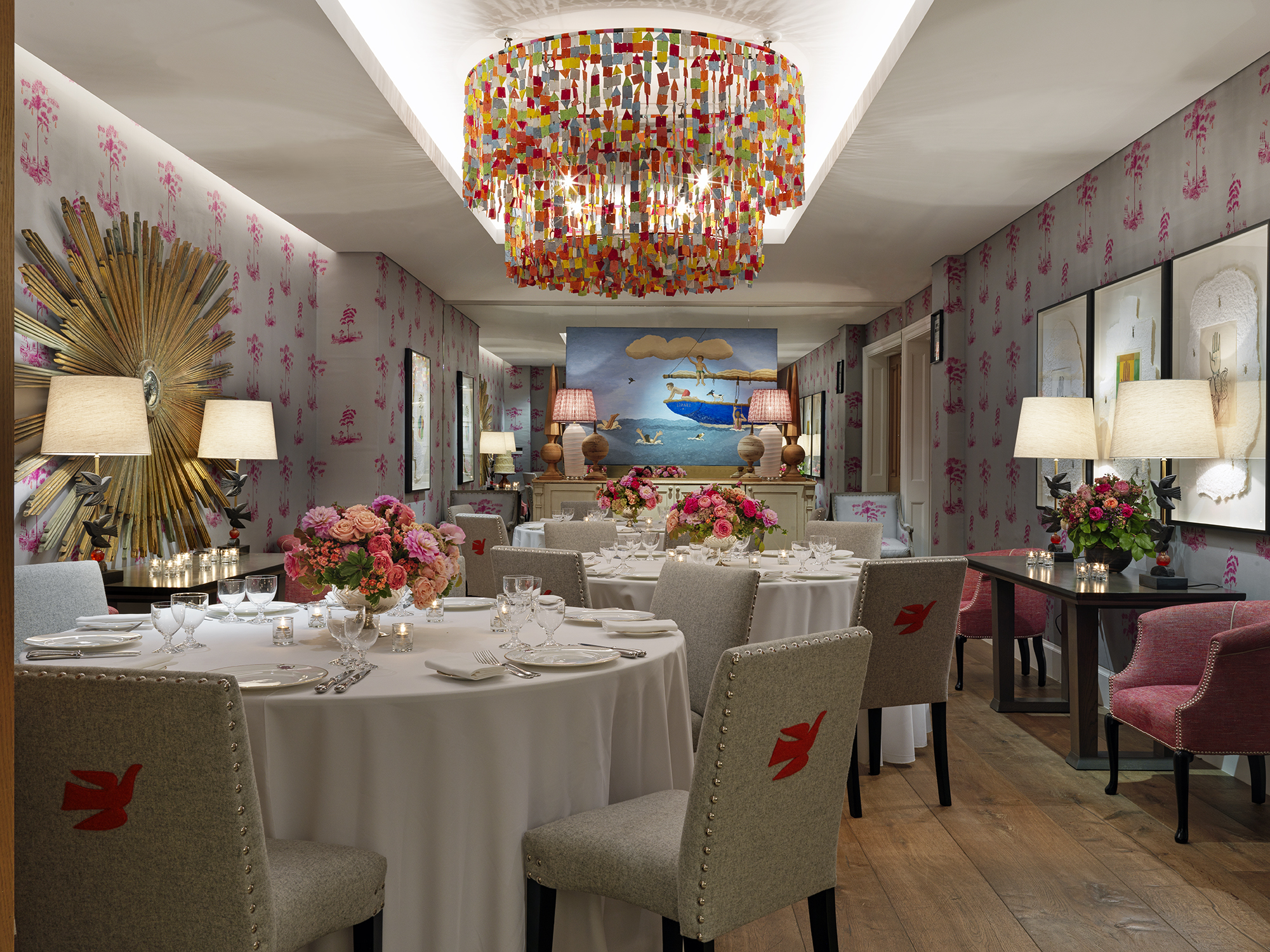 Round dining tables set-up in the Spring private events room at Crosby Street Hotel