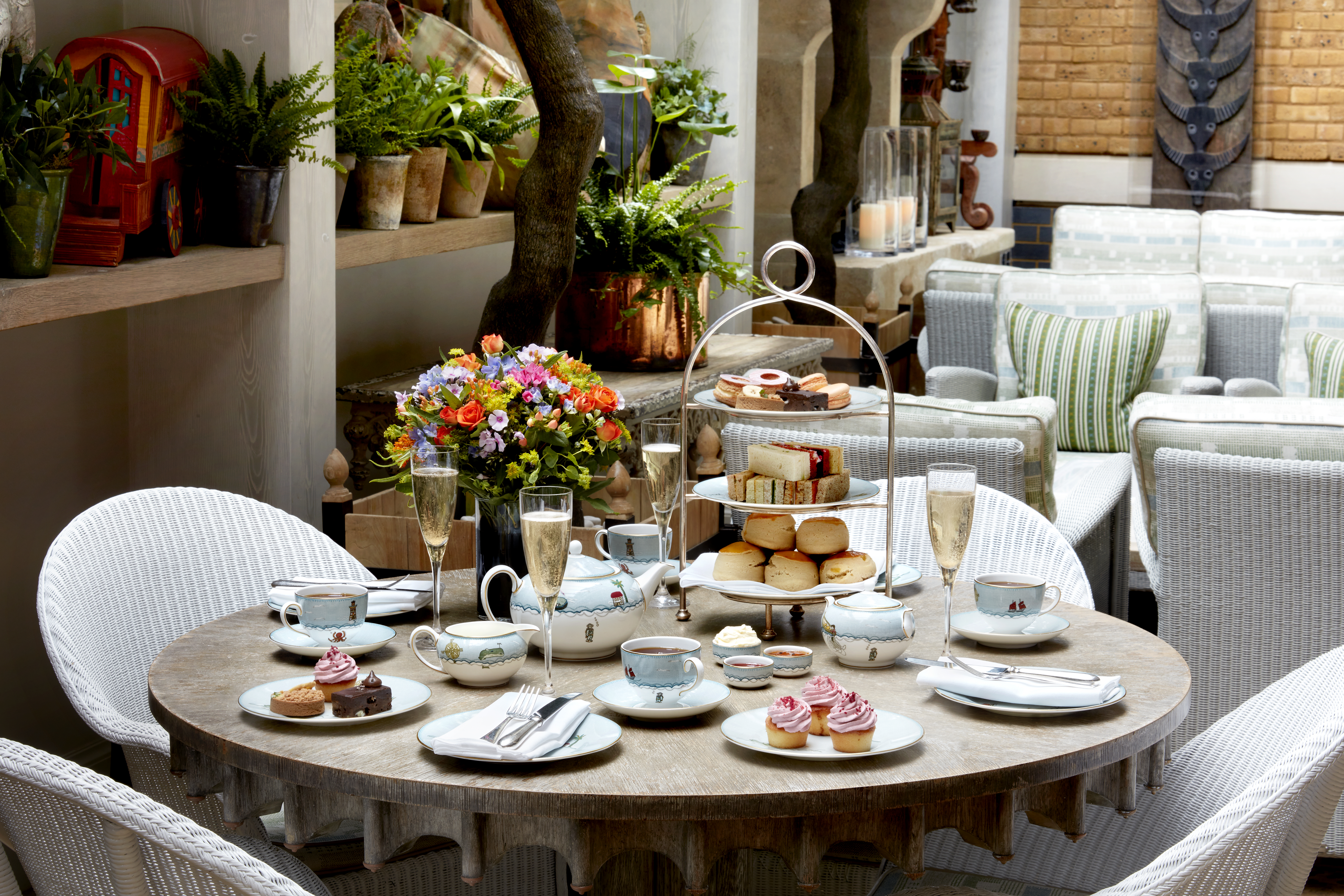 Wide shot of Traditional Afternoon Tea with Champagne in the Orangery at Ham Yard