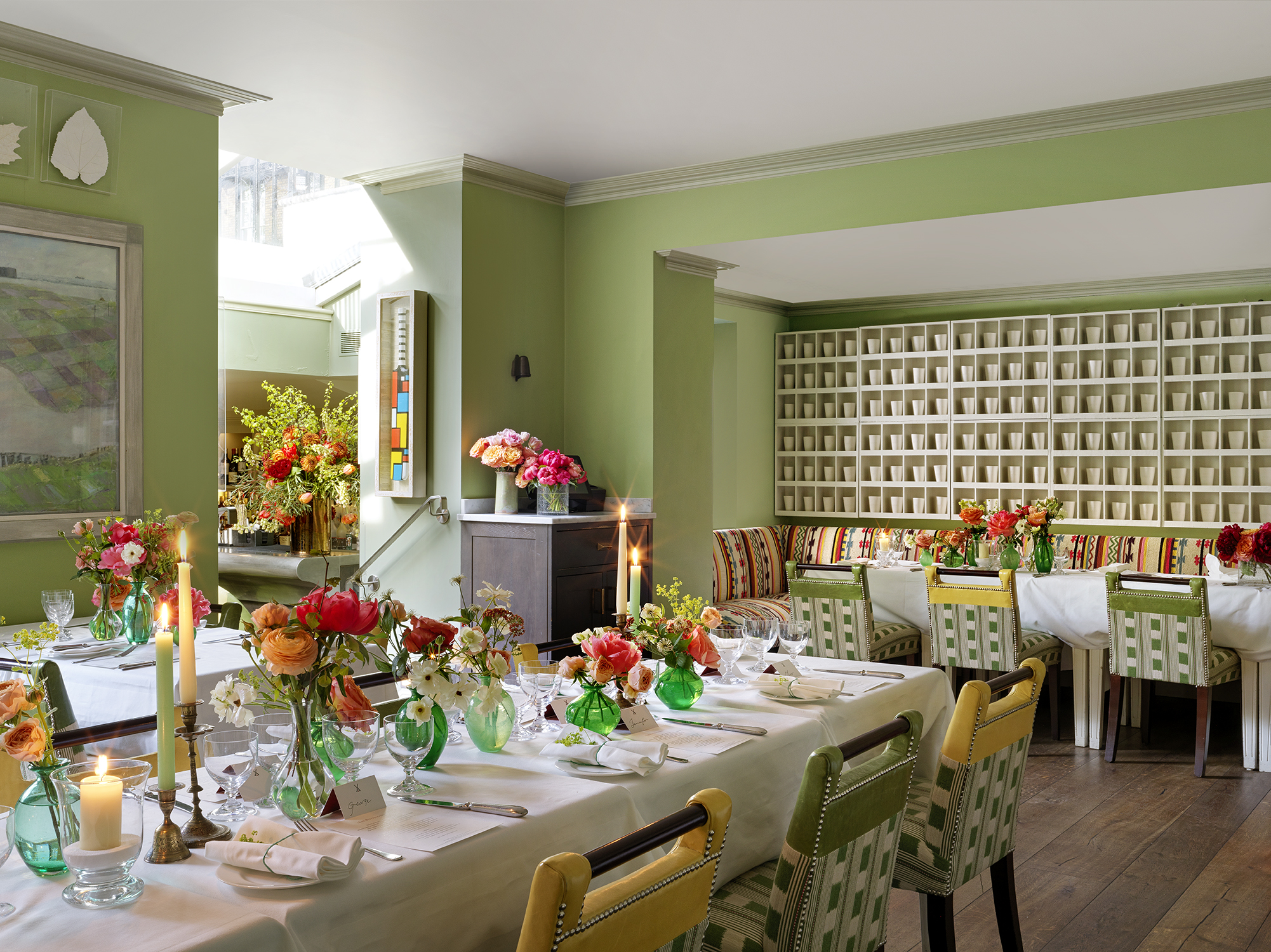 Diagonal shot long dining tables for a wedding set-up in the Potting Shed at Dorset Square Hotel