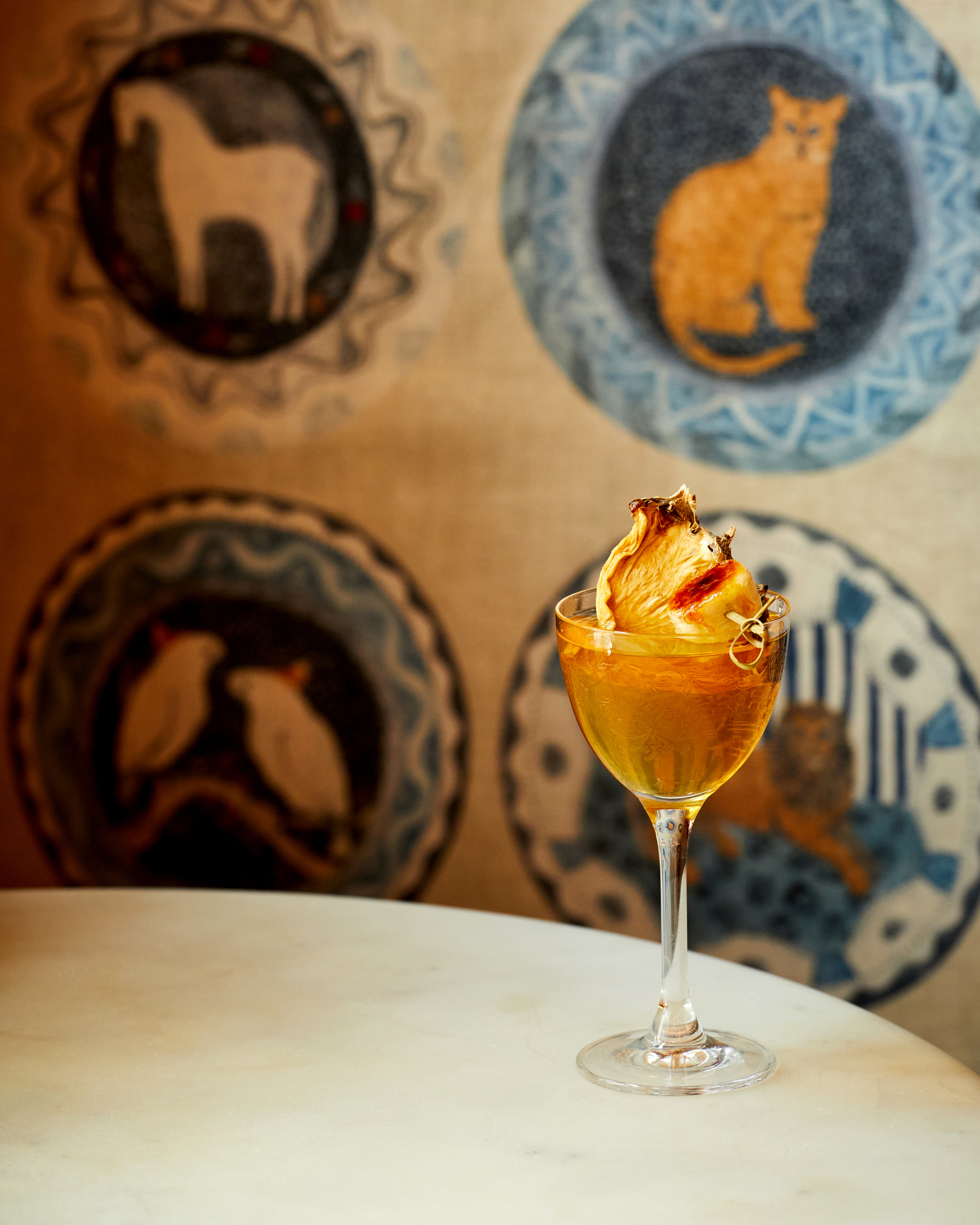 Close up shot of a yellow cocktail in The Whitby Bar in The Whitby Hotel