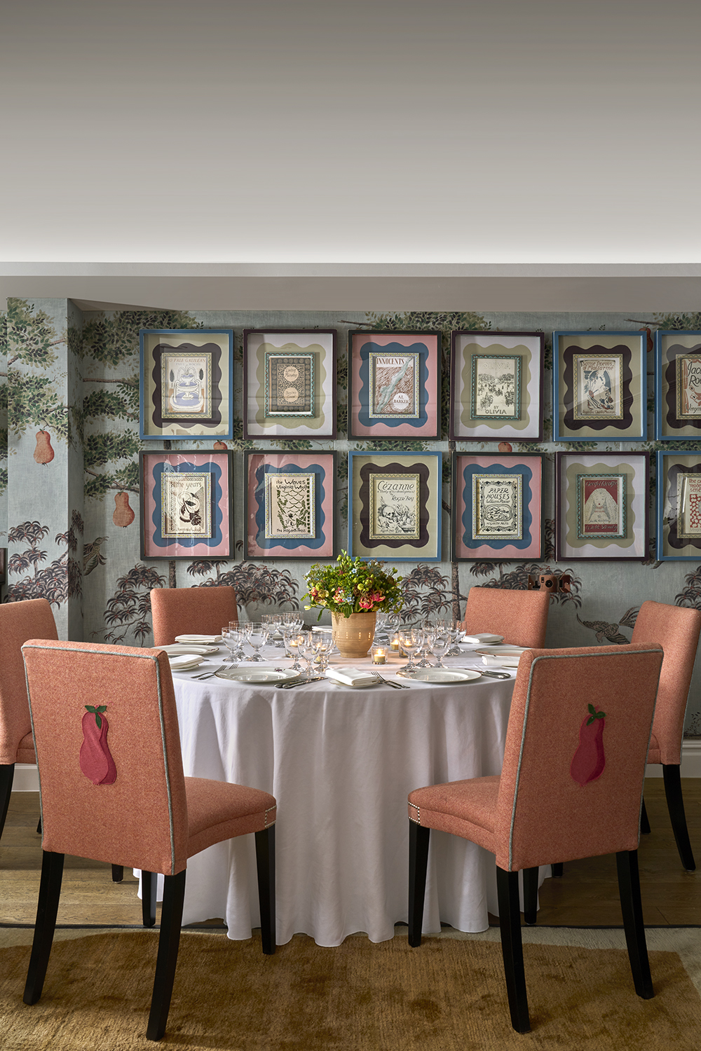 A close up portrait shot of a round private dining table set up in the Duncan Grant private events room at Charlotte Street Hotel