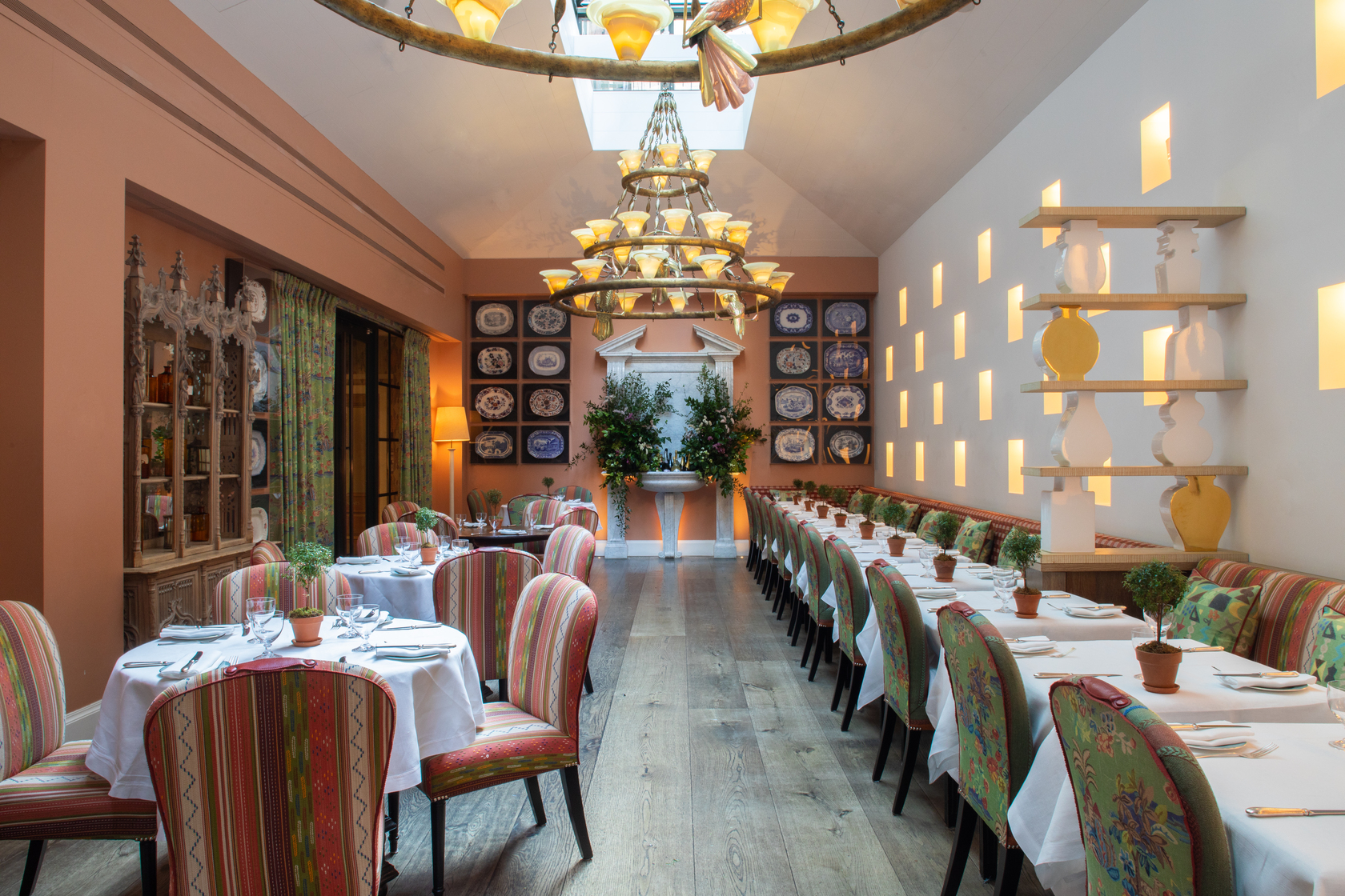 Both square and round dining tables set-up in the Orangery private events room at the Whitby Hotel