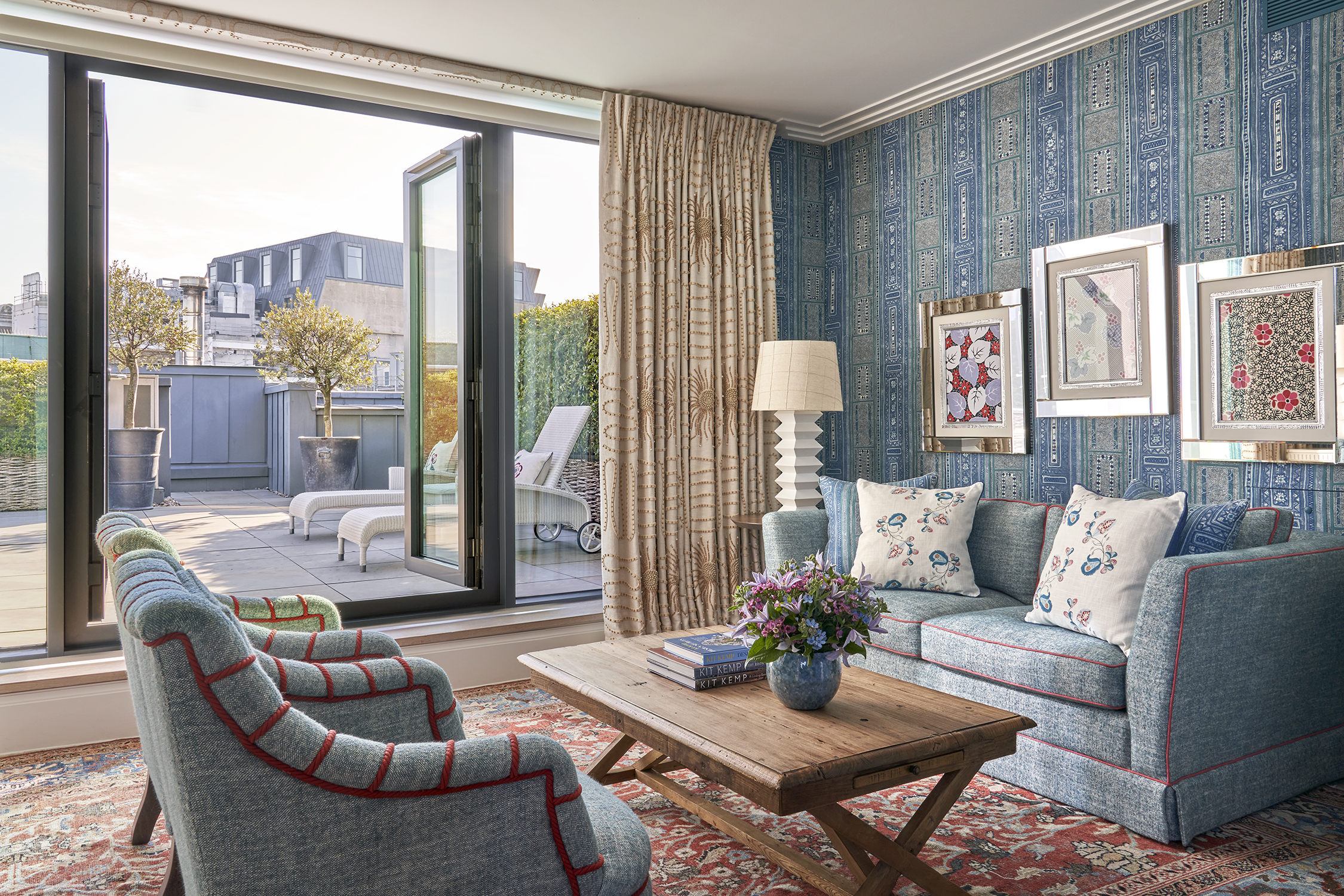 Seating area and leading into the terrace of Residence 23, a Duplex Residence at Ham Yard Hotel