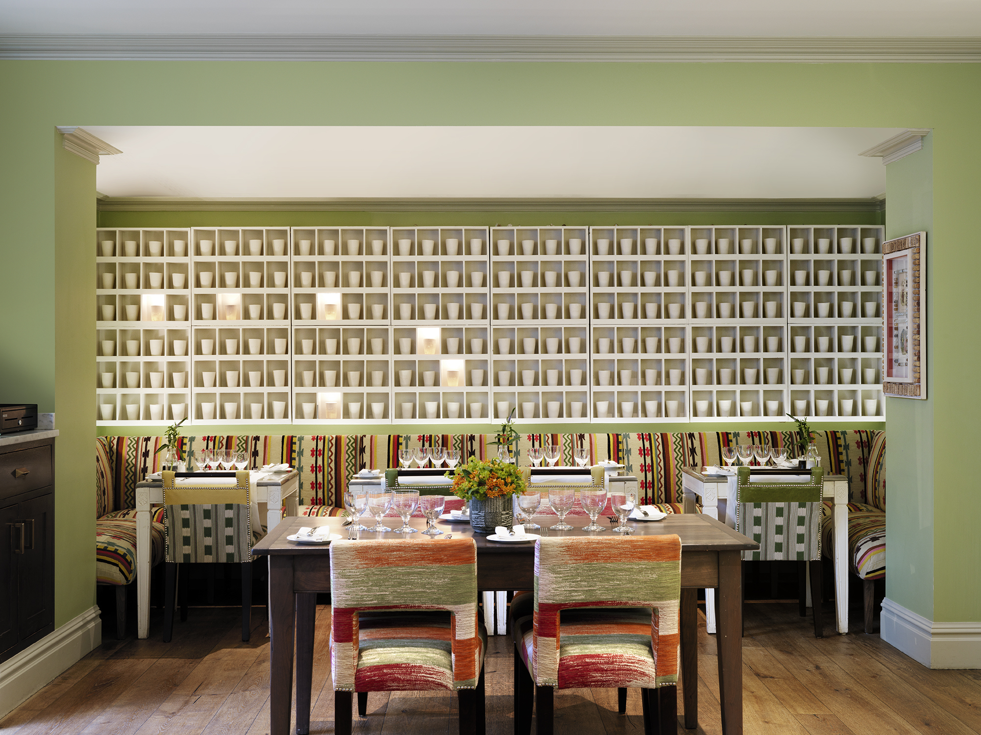 Front shot of the main art wall of the Potting Shed at Dorset Square Hotel