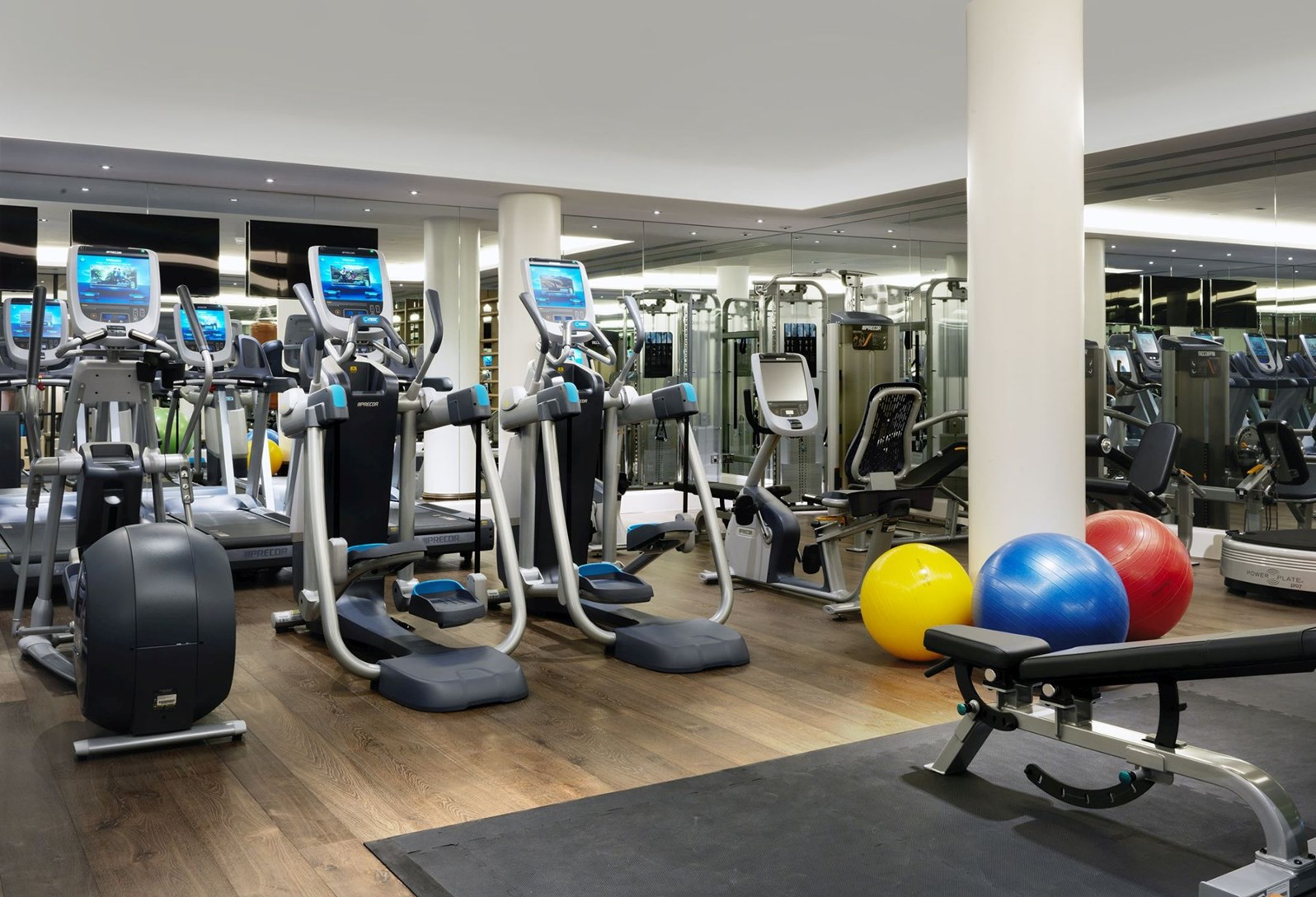 The gym at Ham Yard Hote featuring cross trainers and running machines