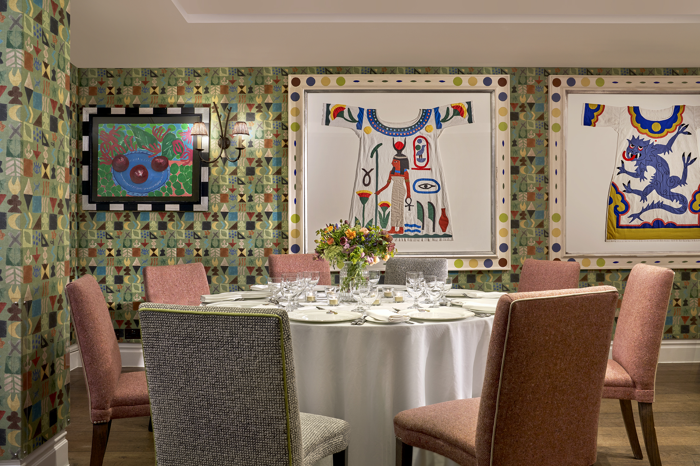 A close shot a round dining table in the Vanessa Bell private events room at Charlotte Street Hotel