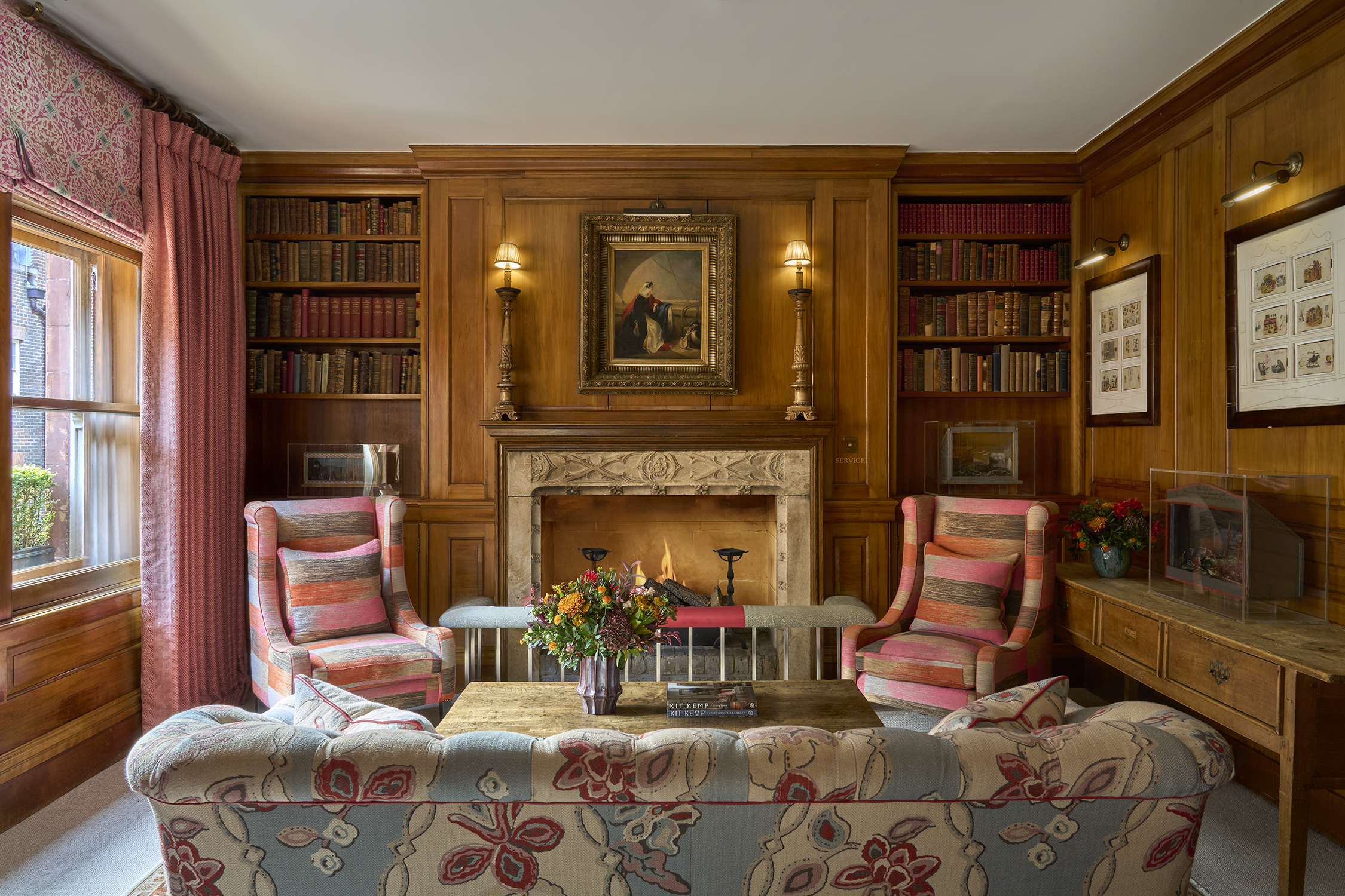Close shot of the fireplace of the Library at Covent Garden Hotel