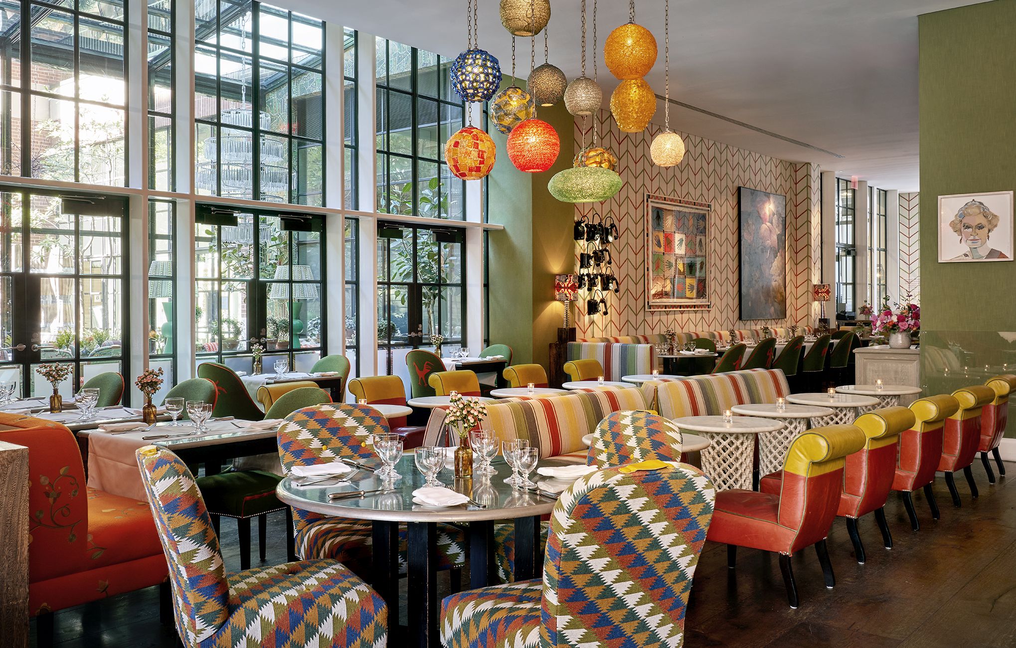 Bar and restaurant area and window onto the Orangery at Crosby Street Hotel