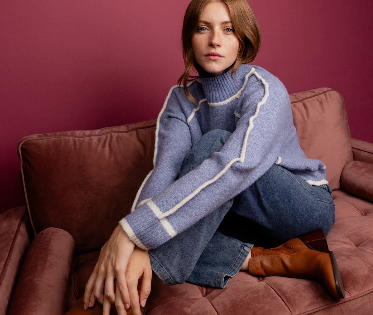 A woman modelling clothes from Ahkeke in Ham Yard Village