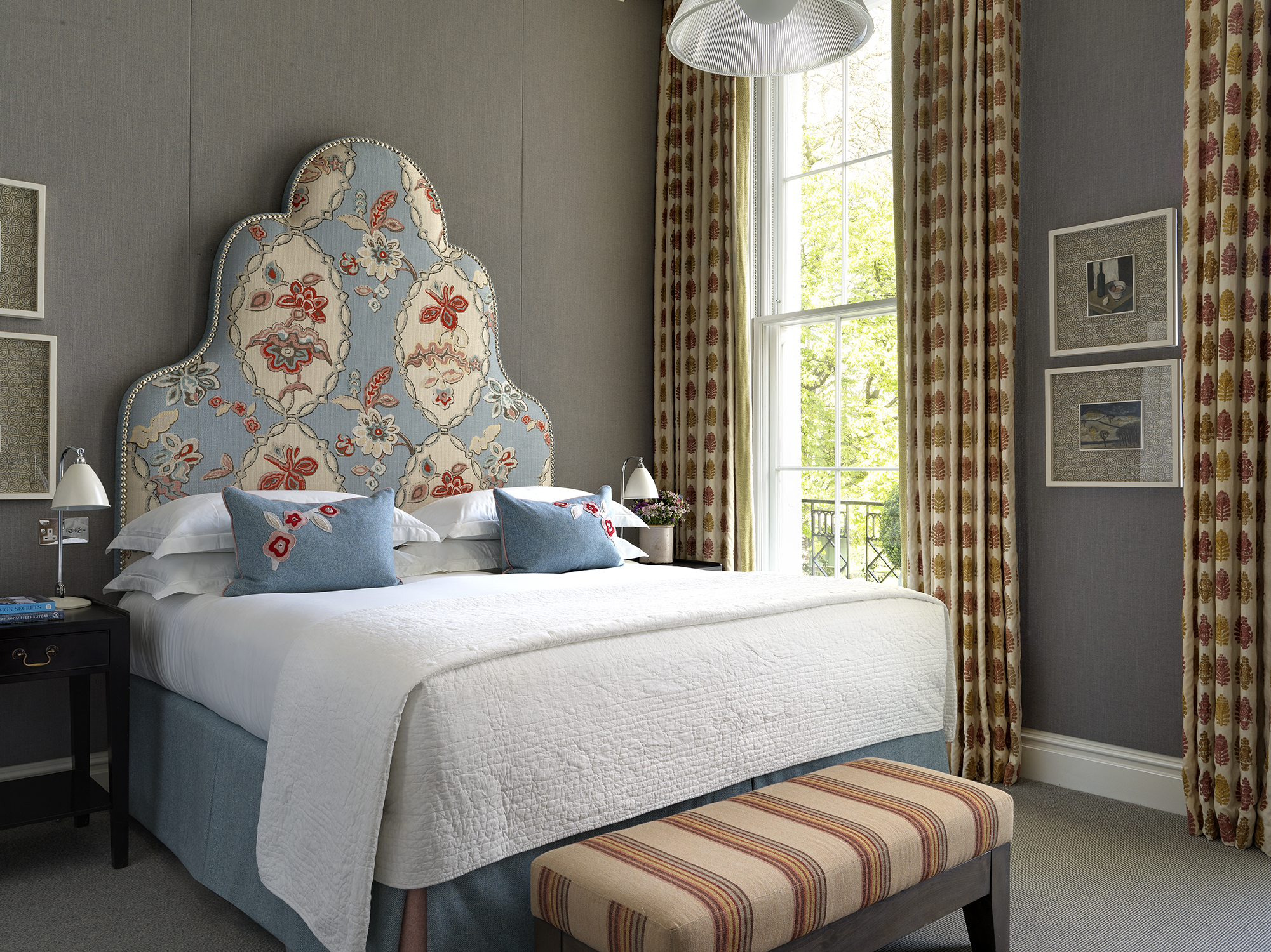 Bedroom shot of room 102, a Deluxe King Room at Dorset Square Hotel