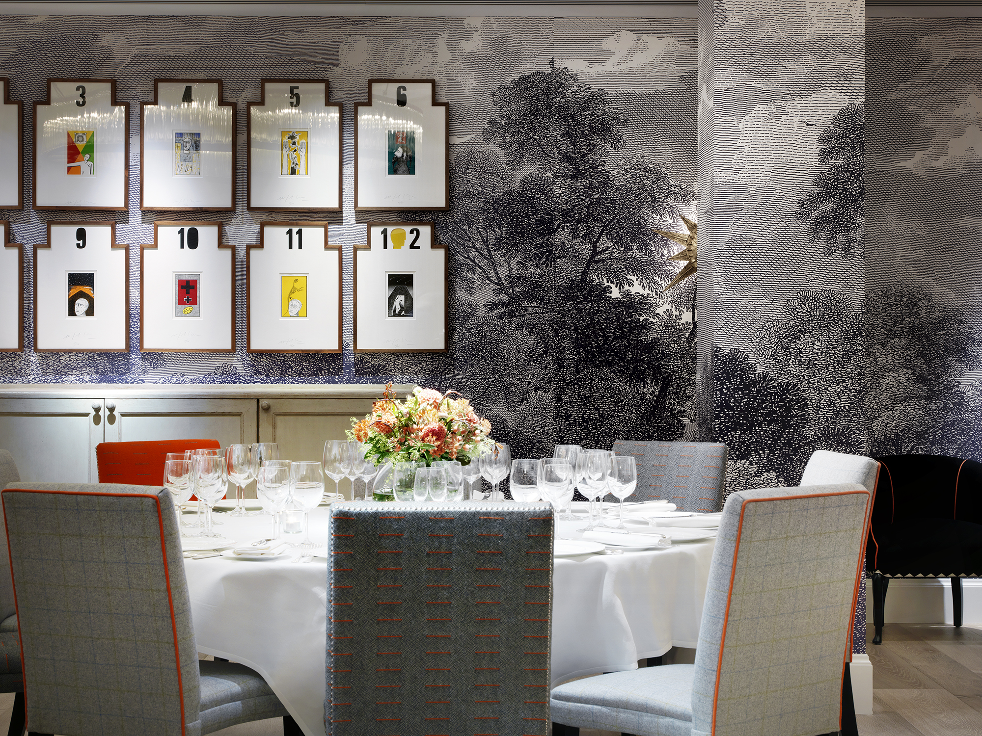 Close shot of a round dining table set-up in the Windmill private events room at Ham Yard Hotel