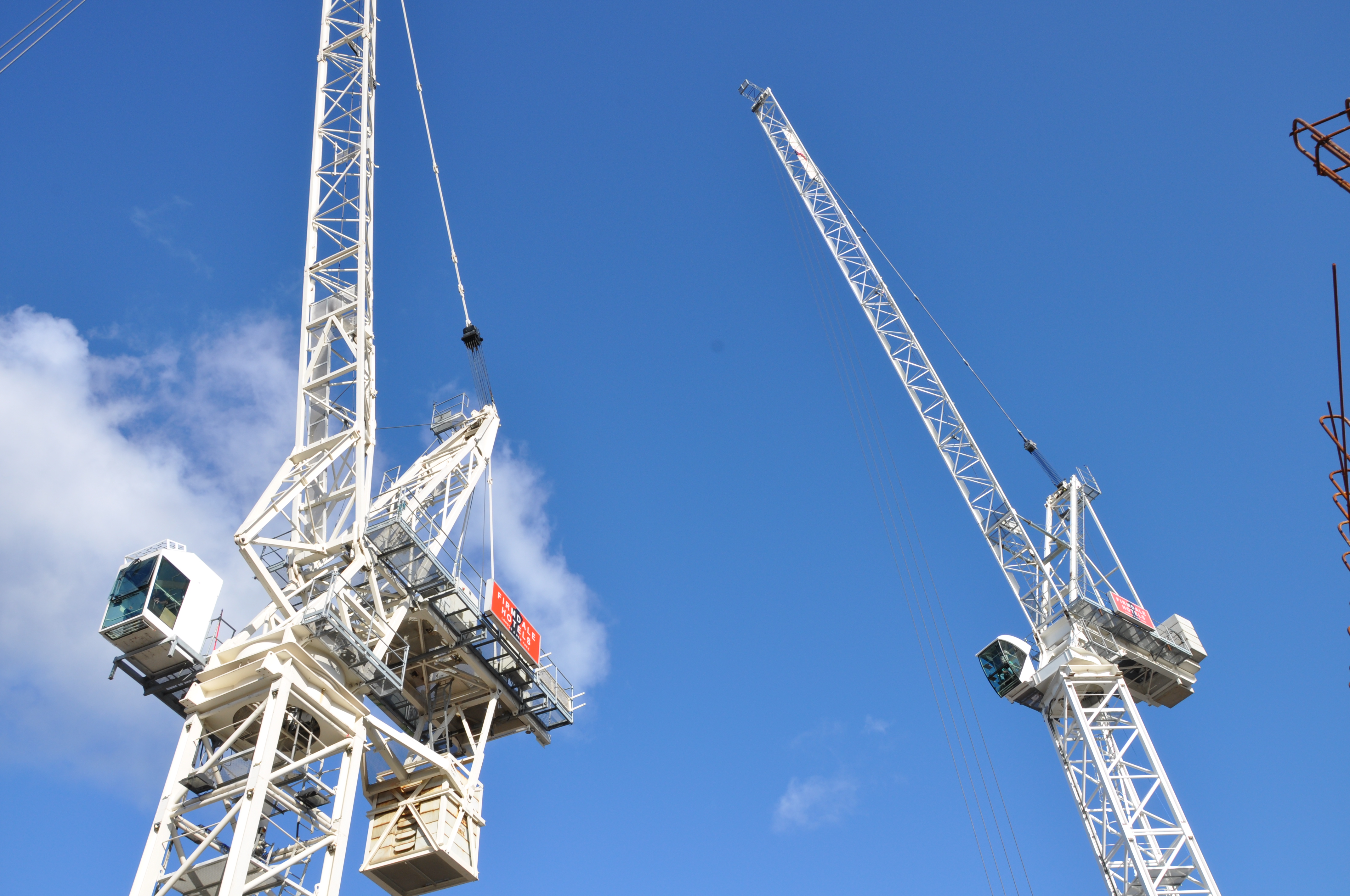 Two cranes with Firmdale Hotels logos