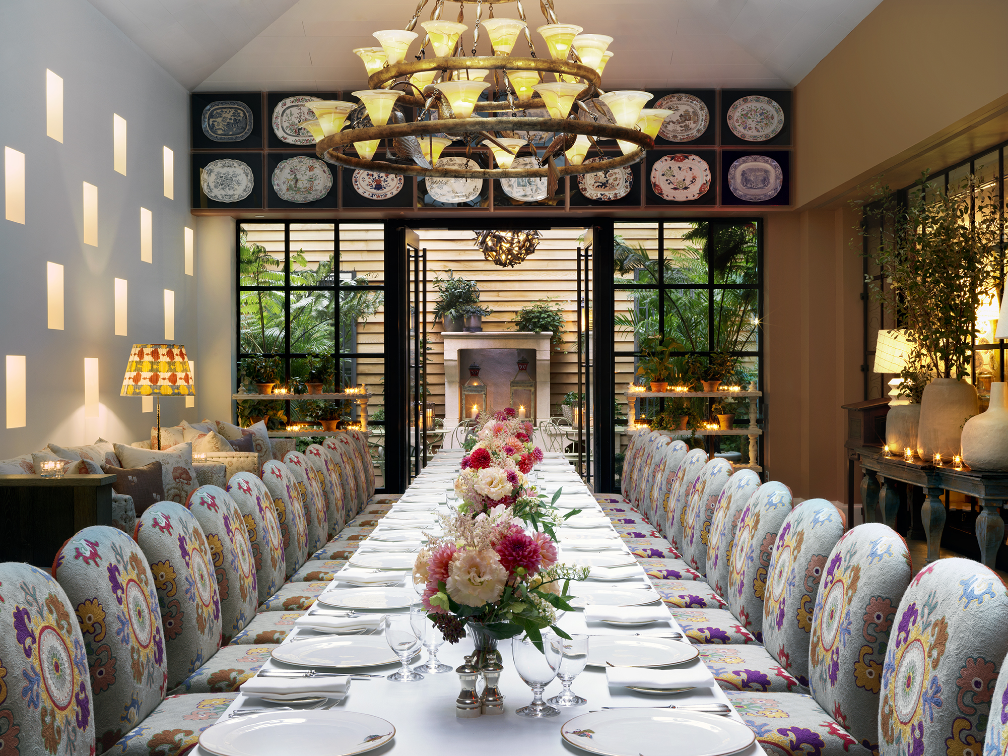 Close shot of long dining tables set-up in the Orangery private events room at the Whitby Hotel
