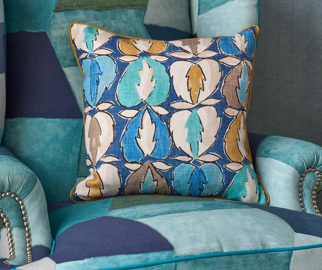 Teal and shop ochre cushions