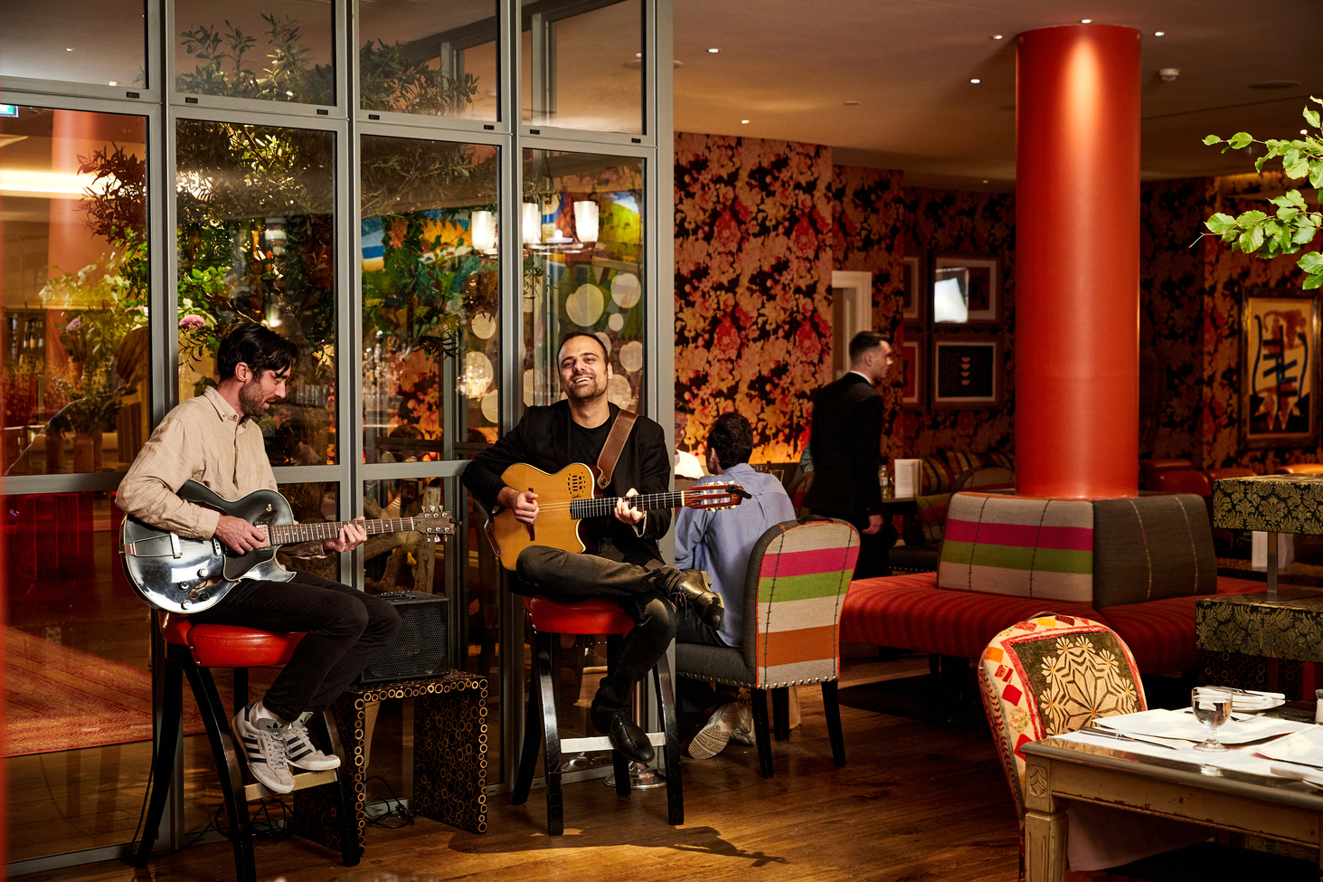 Two guitarists playing at Refuel