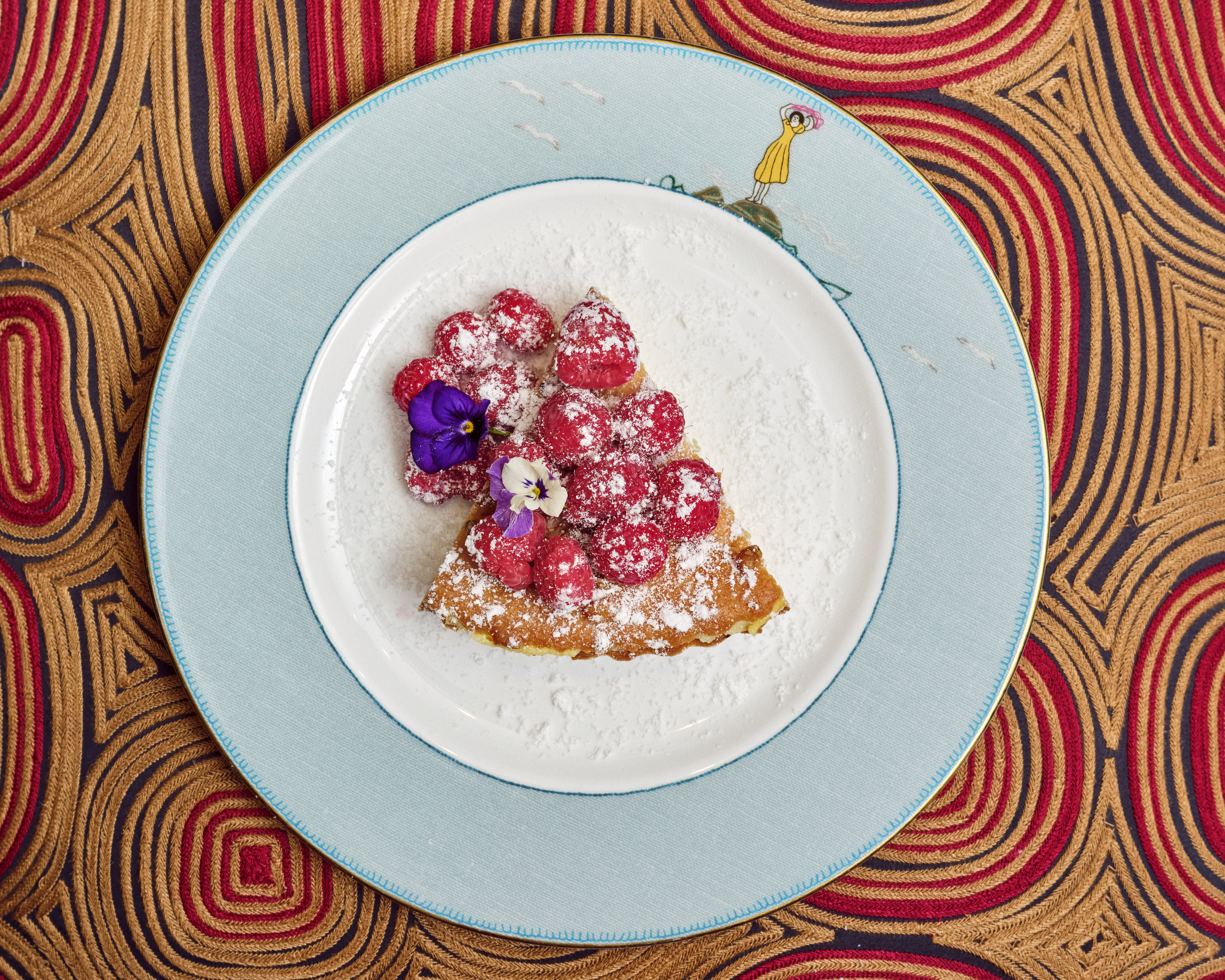 A slice of berry tart on a plate at The Whitby Bar
