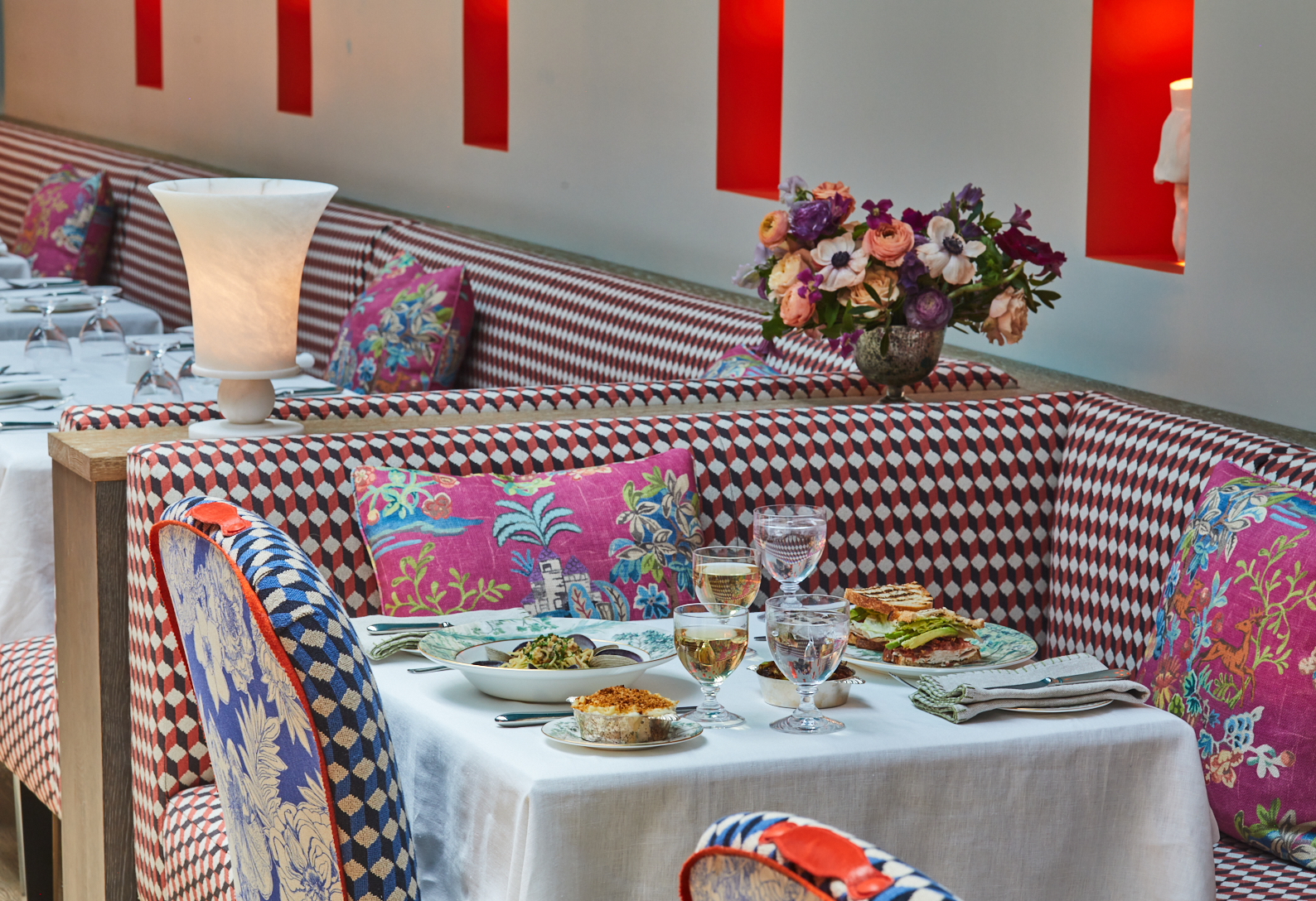 An image of the lunch set up in The Warren Street Hotel, on the table we see multiple dishes from the A La Carte menu.