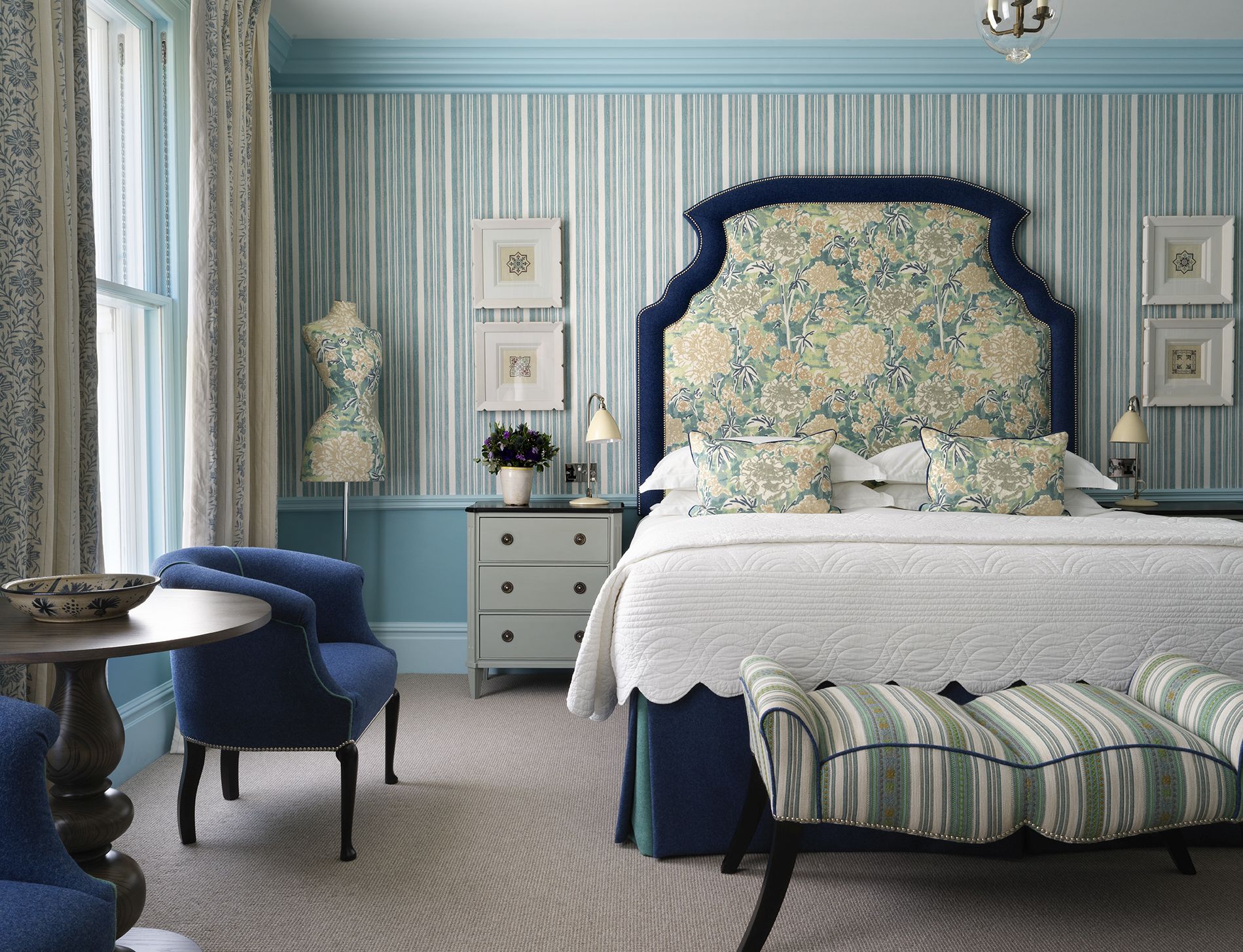 Bedroom front shot of room 202, a Deluxe Junior Suite at Covent Garden Hotel