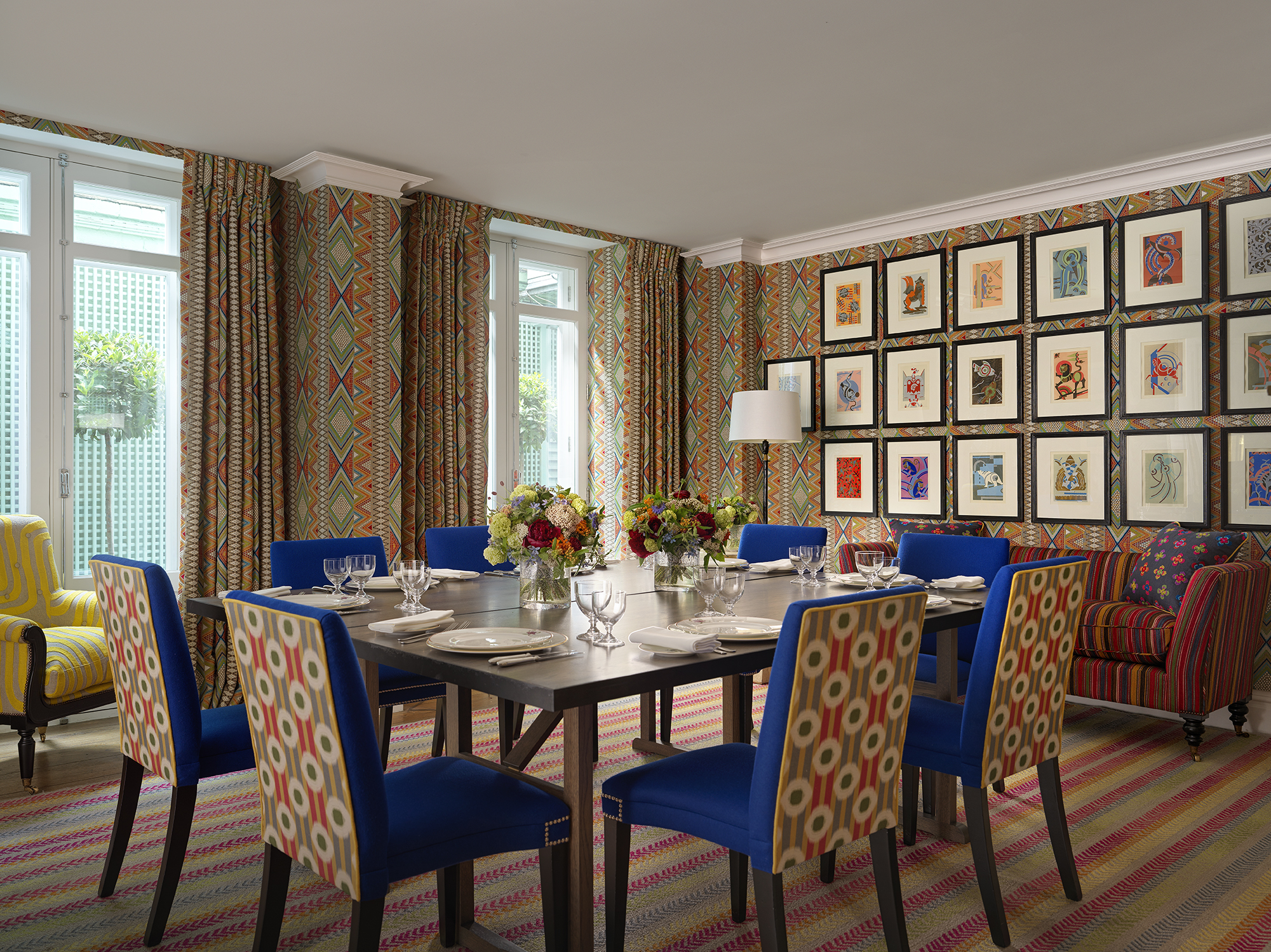 Squared dining table set-up in the Lyric private events room at Covent Garden Hotel