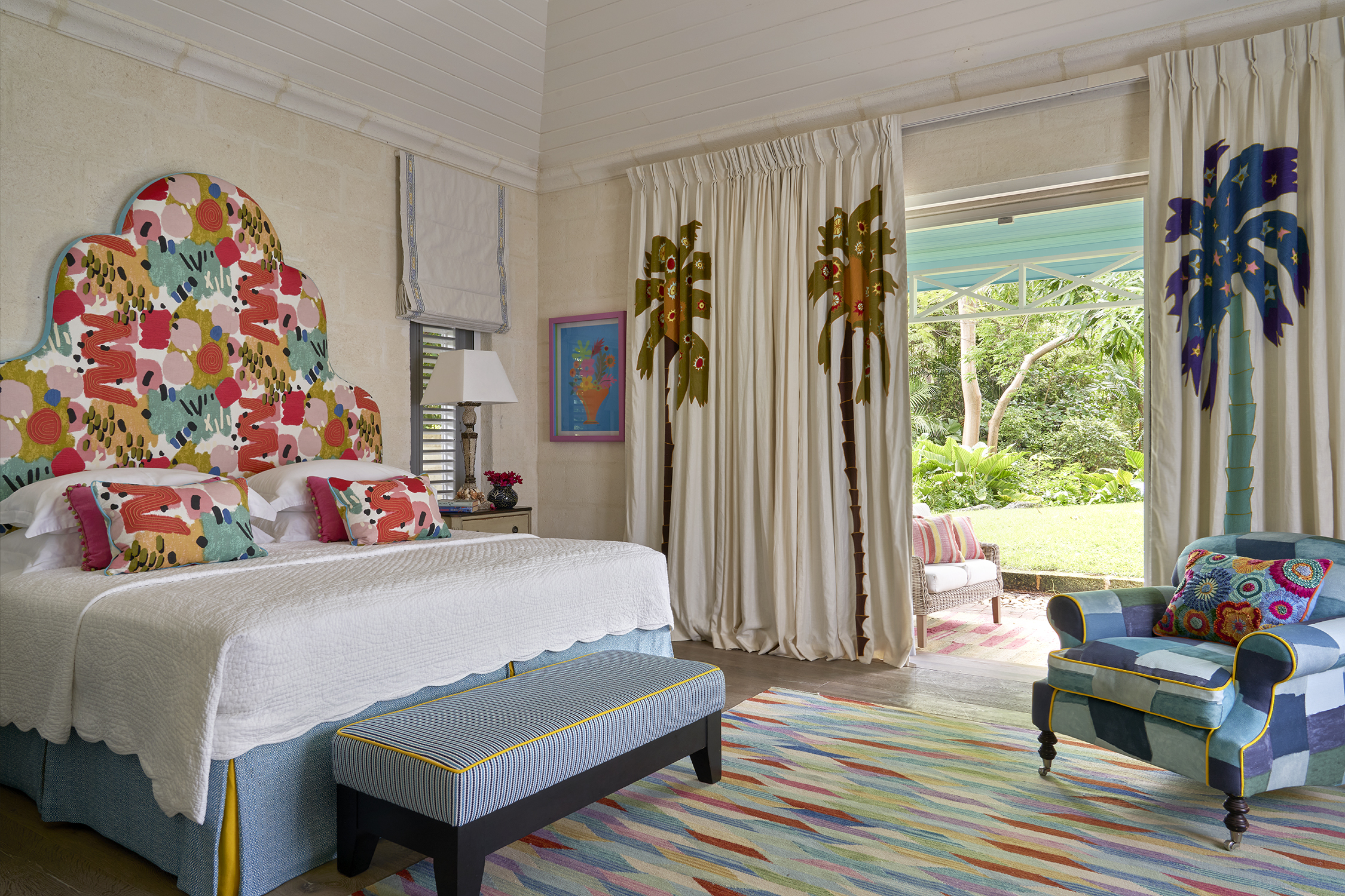 A diagonal image focusing on the bed, in bedroom 2. At Rossferry, the Carribean Property managed by Firmdale Hotels.