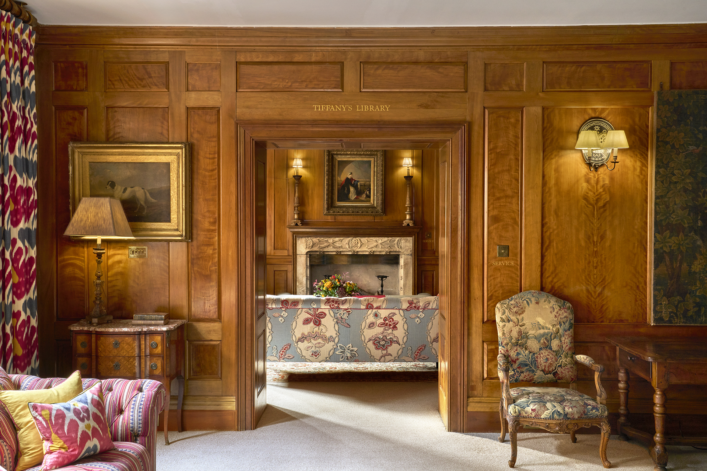 A shot taken looking through the entrance to the library at Covent Garden Hotel from the drawing room