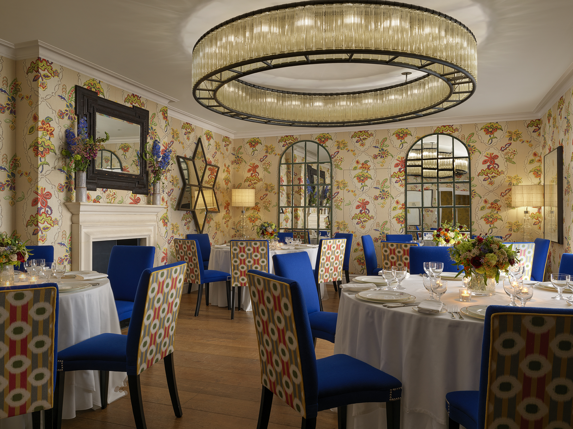 Round dining tables set-up in the Fortune private events room at Covent Garden Hotel