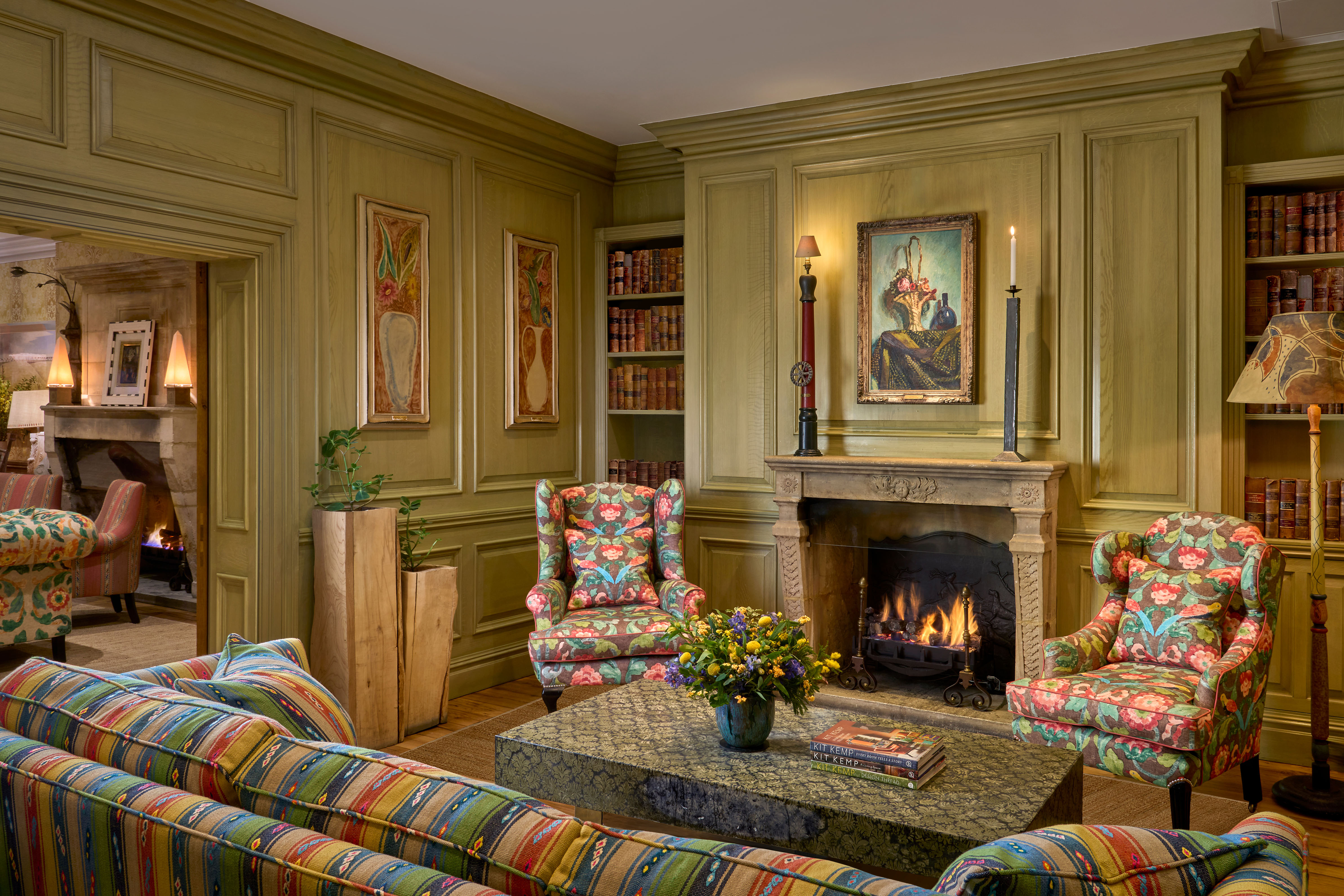 Wide shot of the fireplace in the Library at Charlotte Street Hotel