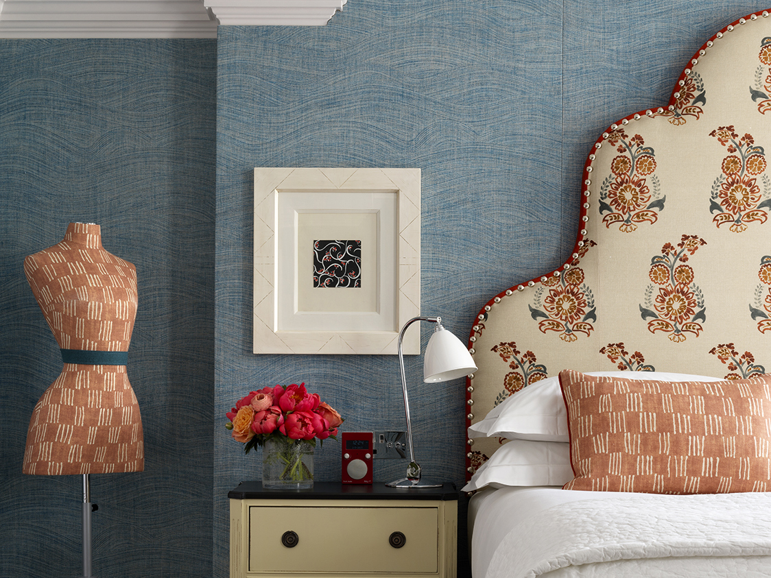 Bed and mannequin shot of room 202, the Dorset Square Room at Dorset Square Hotel