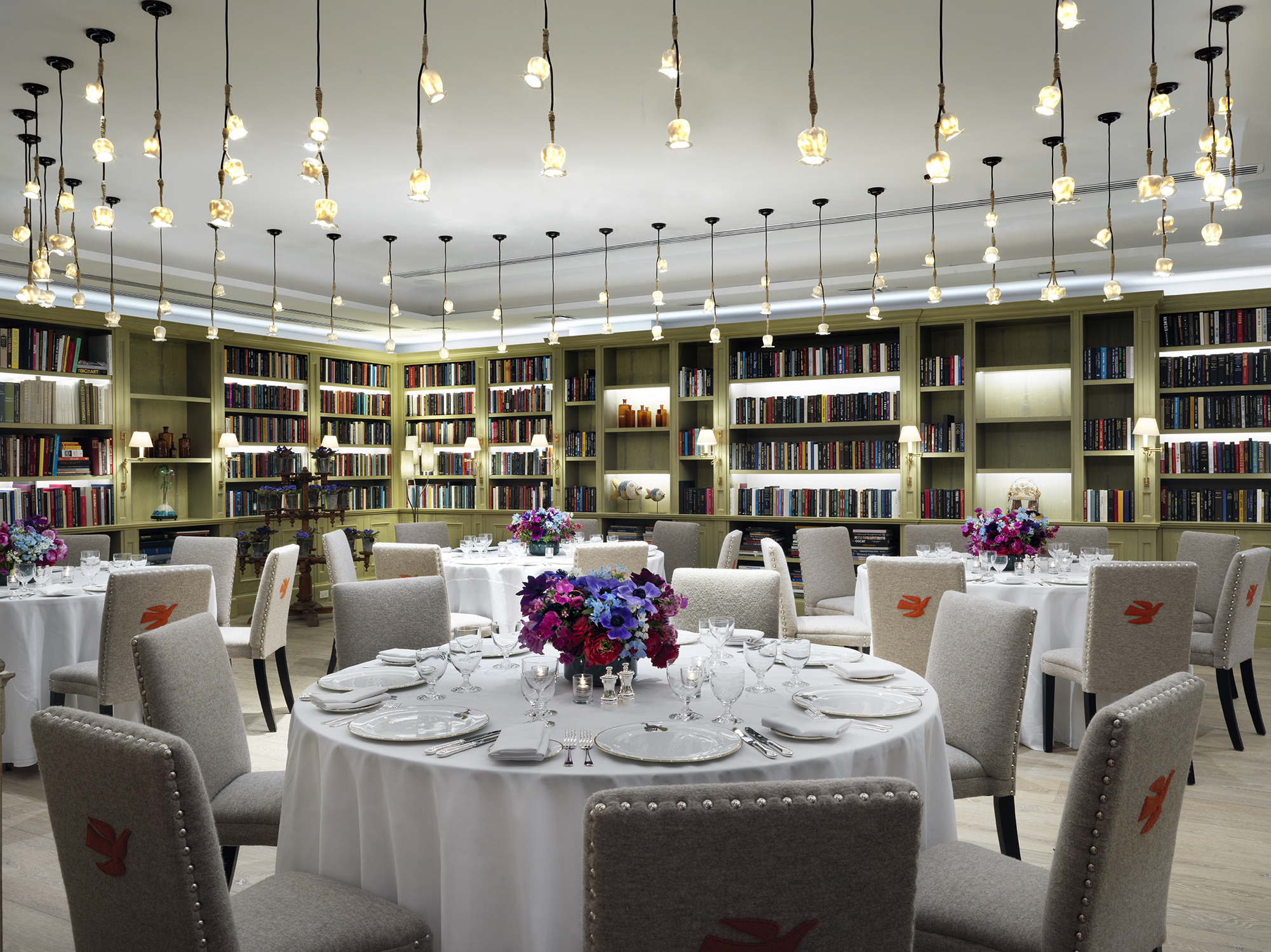Round dining tables set-up in the Reading private events room at the Whitby Hotel