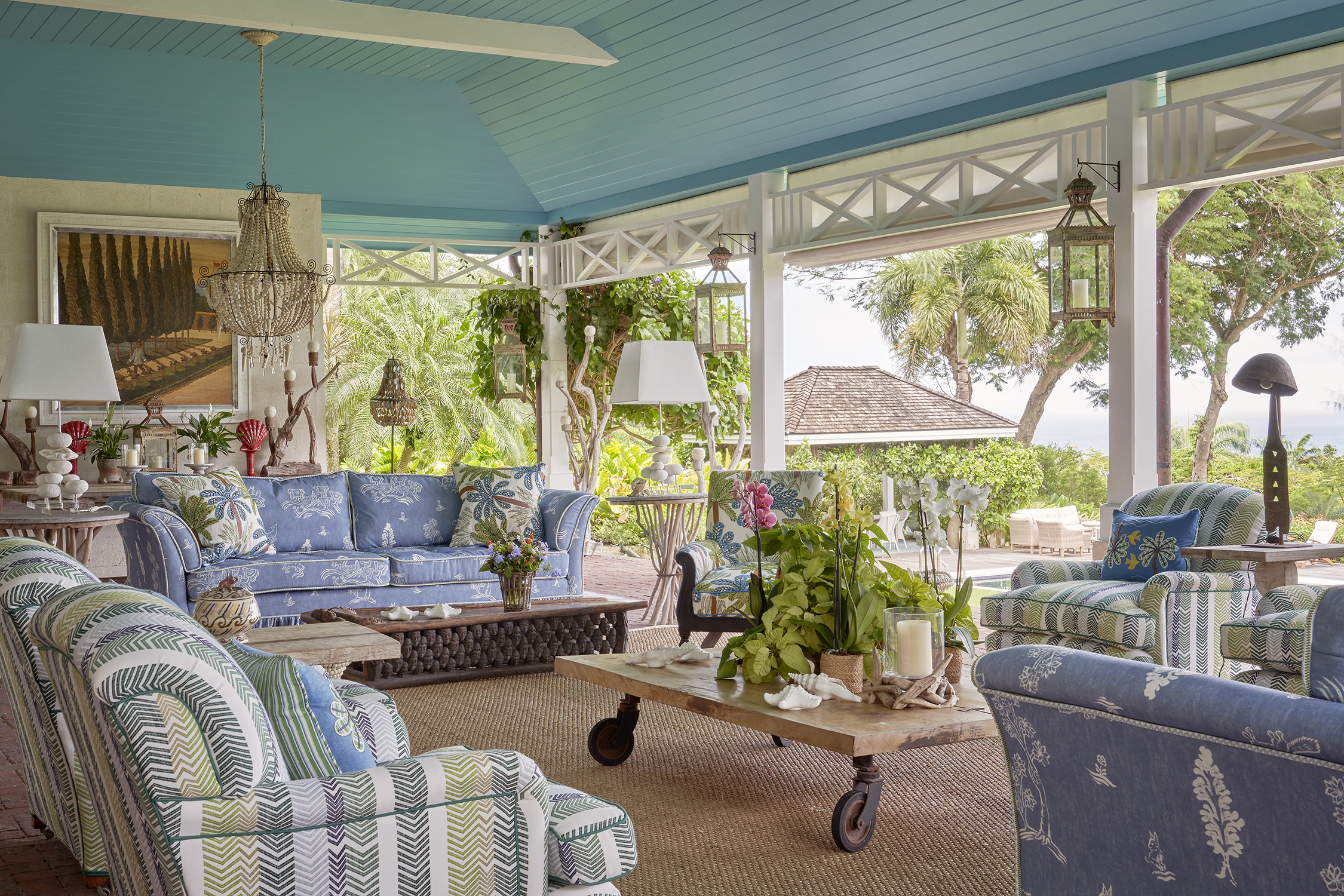 An image of the seating area in the outdoor terrace at Rossferry, the Caribbean property managed by Firmdale Hotels.