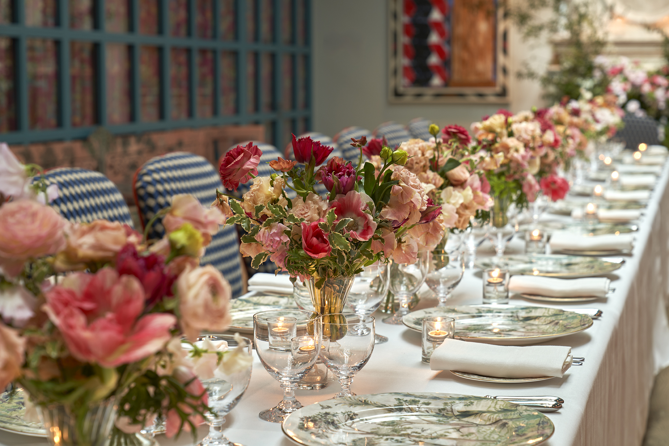 Close shot of a long dining table set-up in the Orangery private events room at Warren Street Hotel