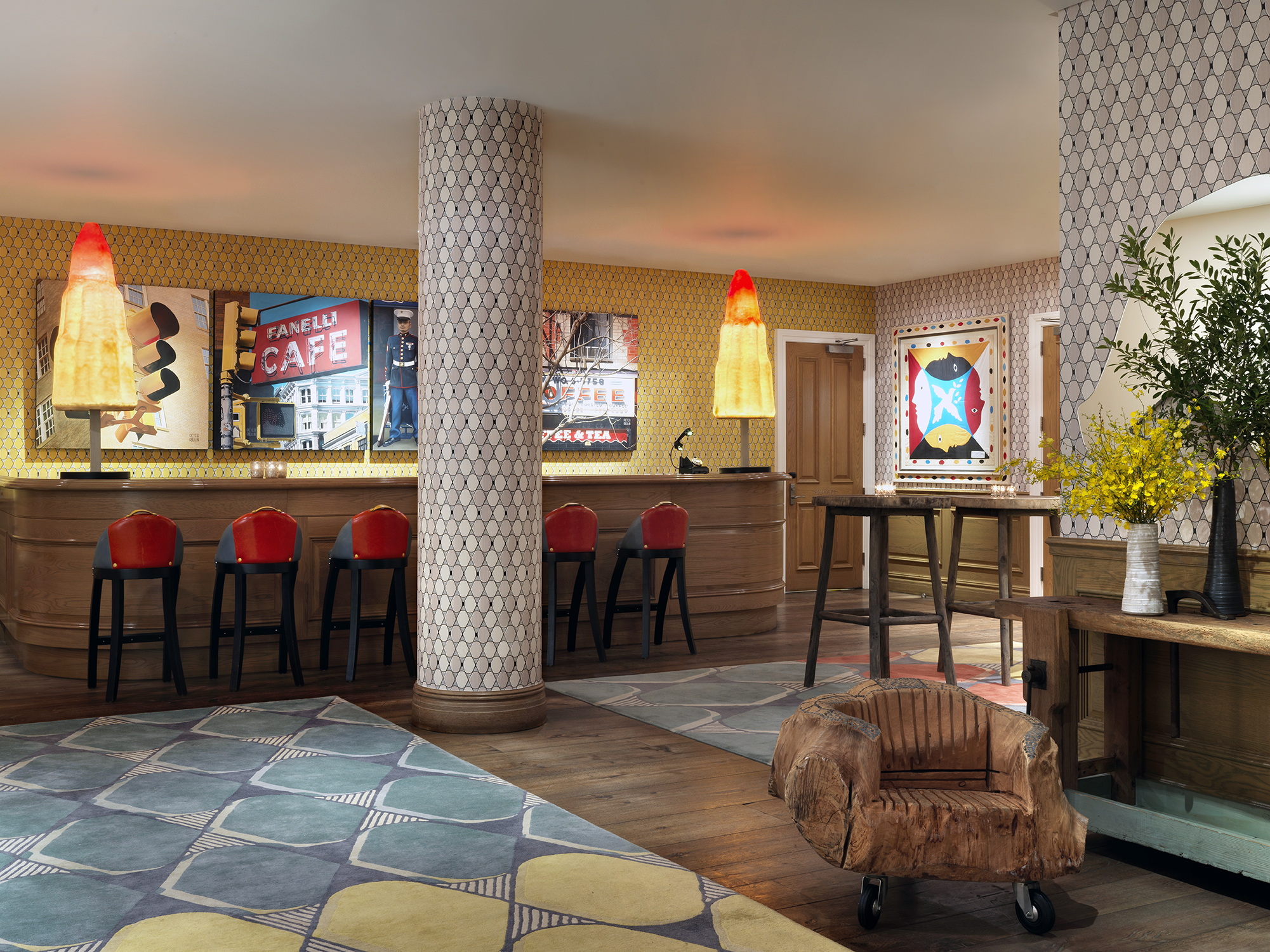 Wide shot of the reception bar in the private events lobby at Crosby Street Hotel